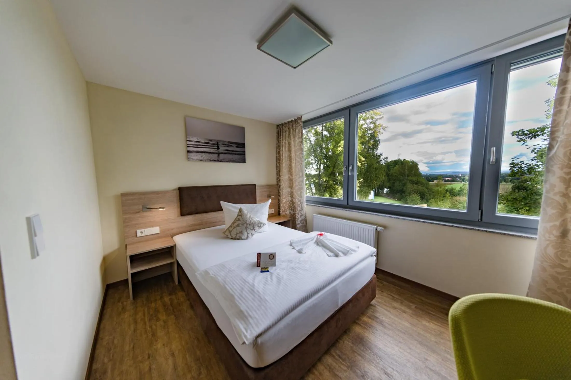 Photo of the whole room, Bed in Hotel-Restaurant Römerhof Superior