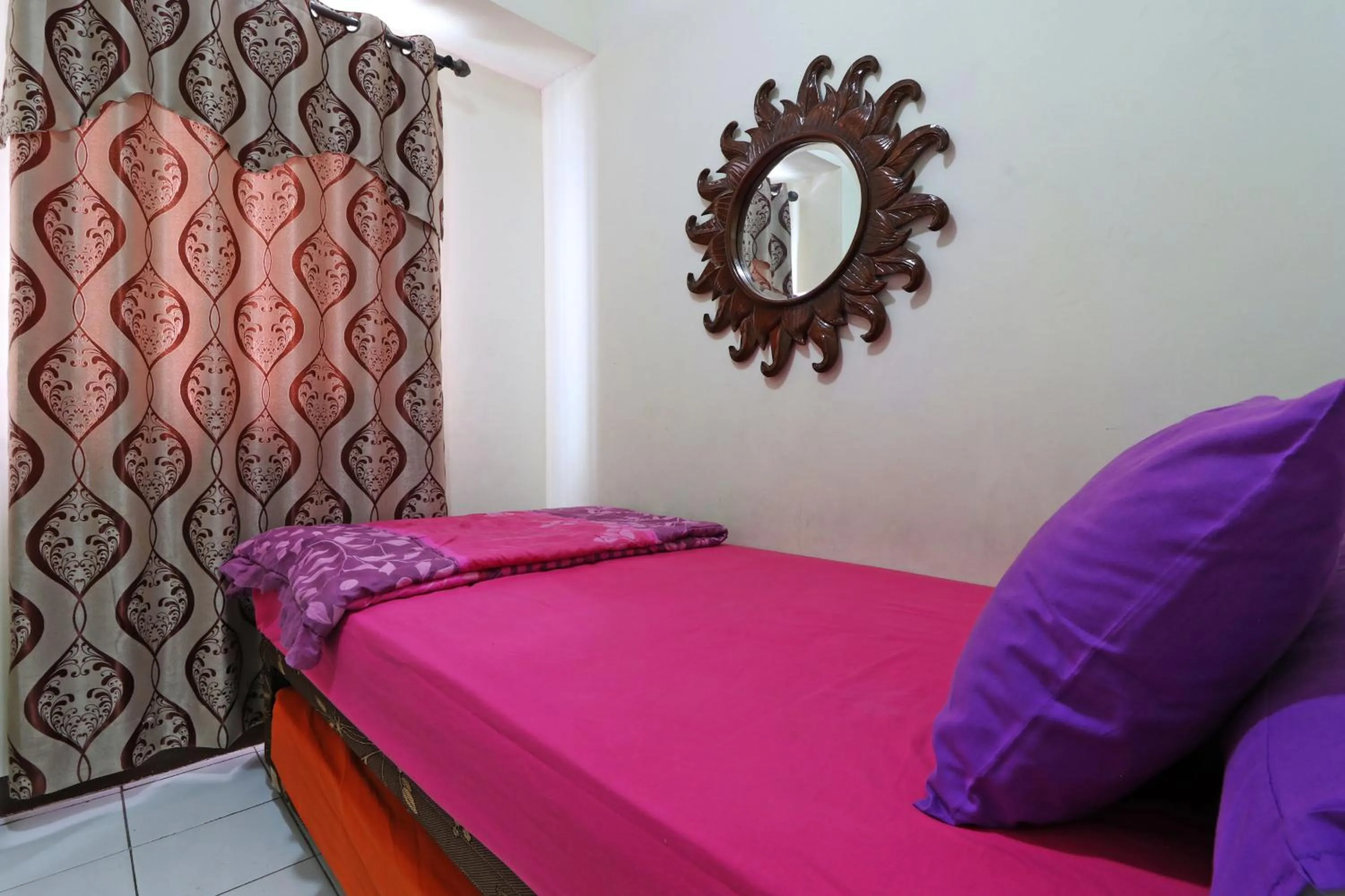 Bed in Inkubus Gateway Apartment Ahmad Yani by Ridwan