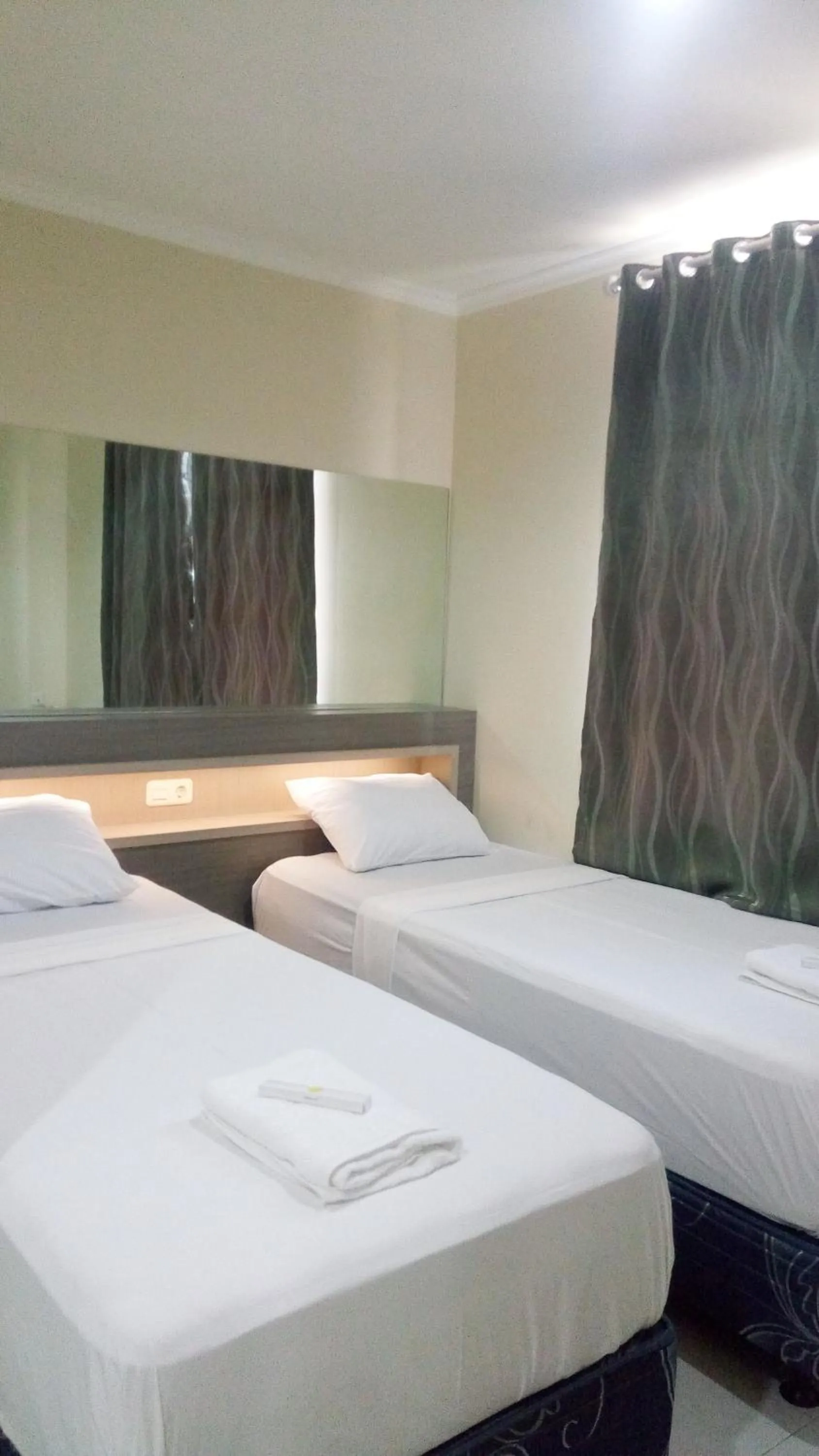 Bed in Ethan Hotel Cilincing Plaza