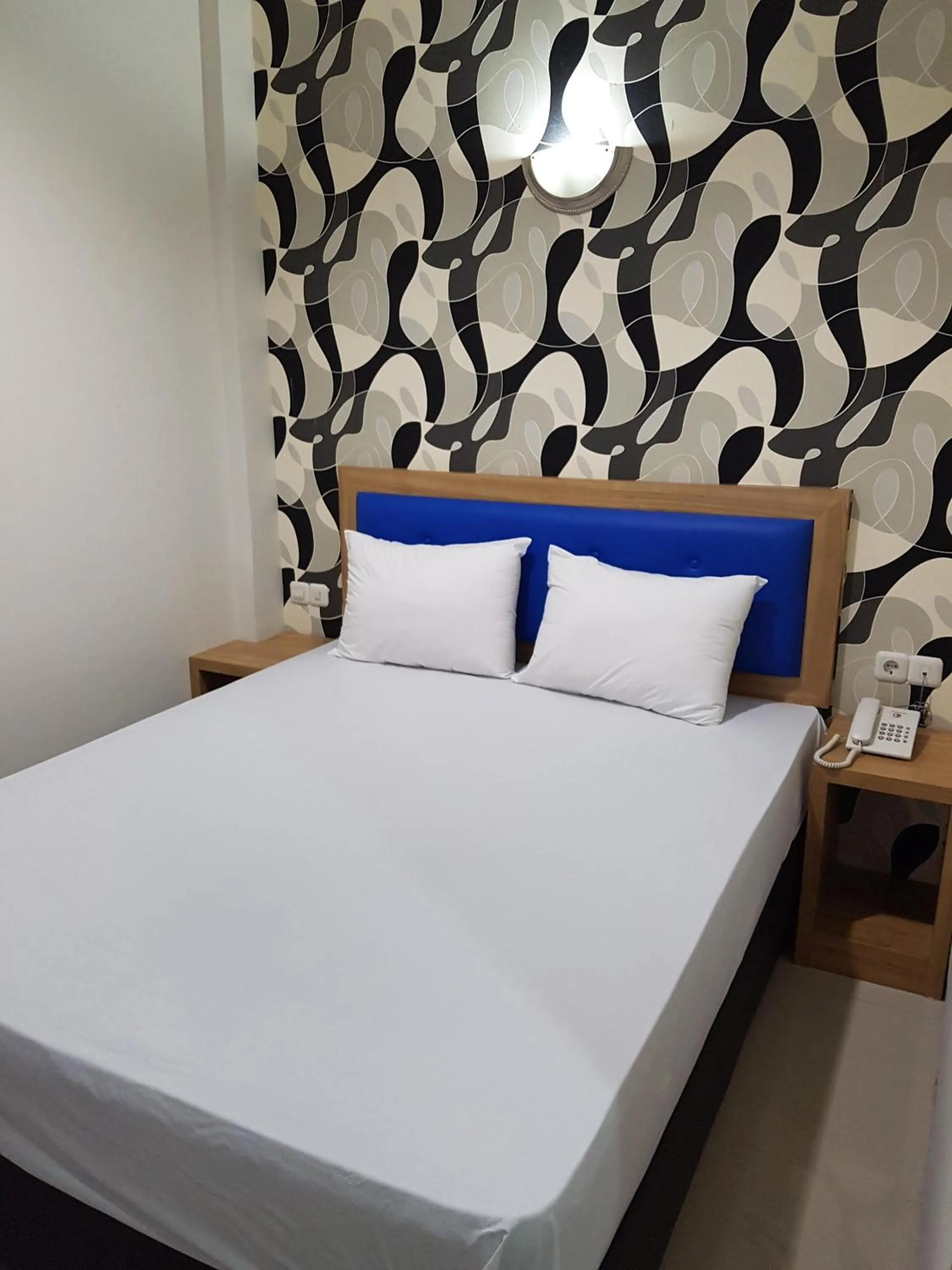 Bed in Ethan Hotel Kelapa Gading