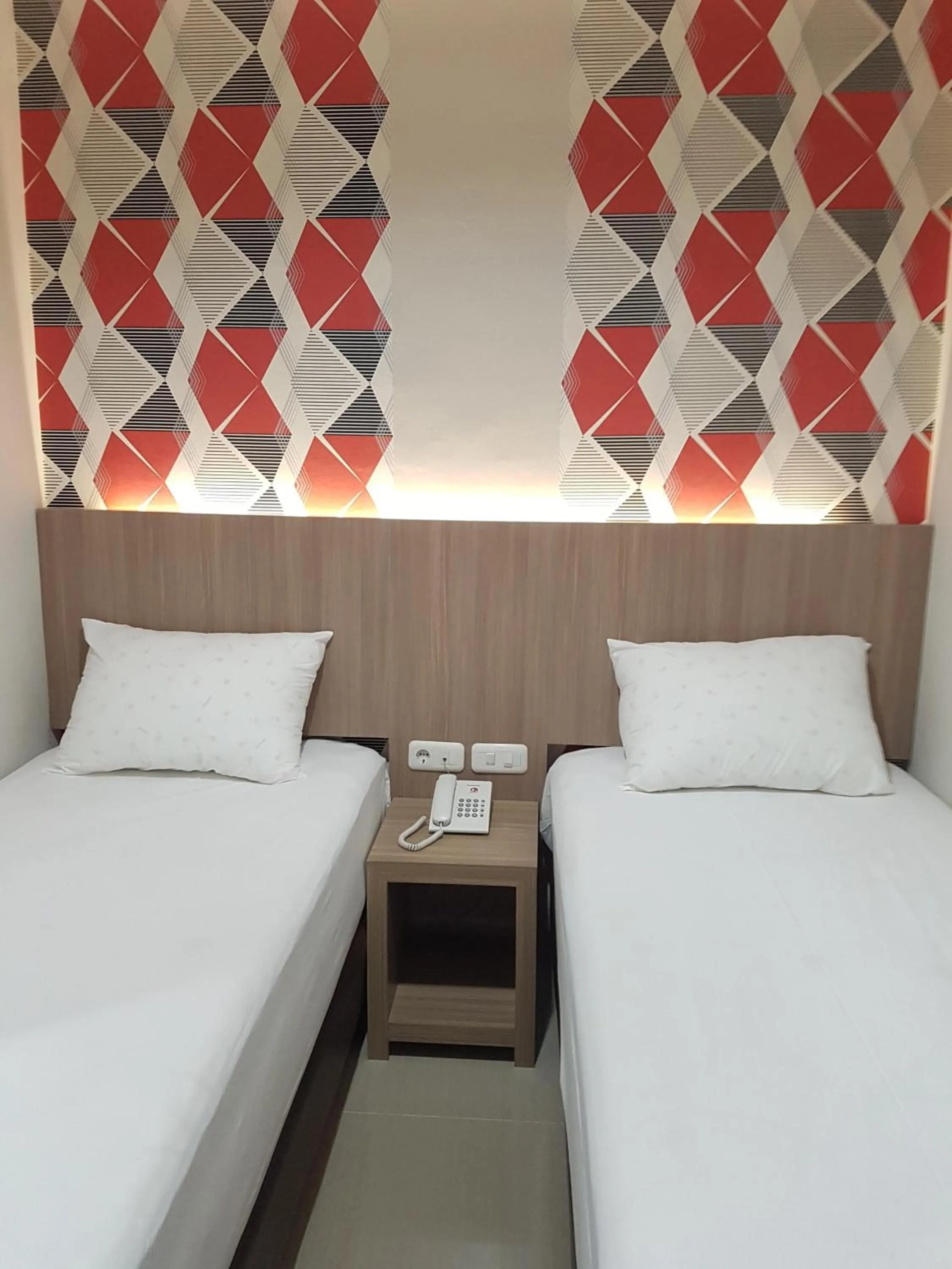 Bed in Ethan Hotel Kelapa Gading
