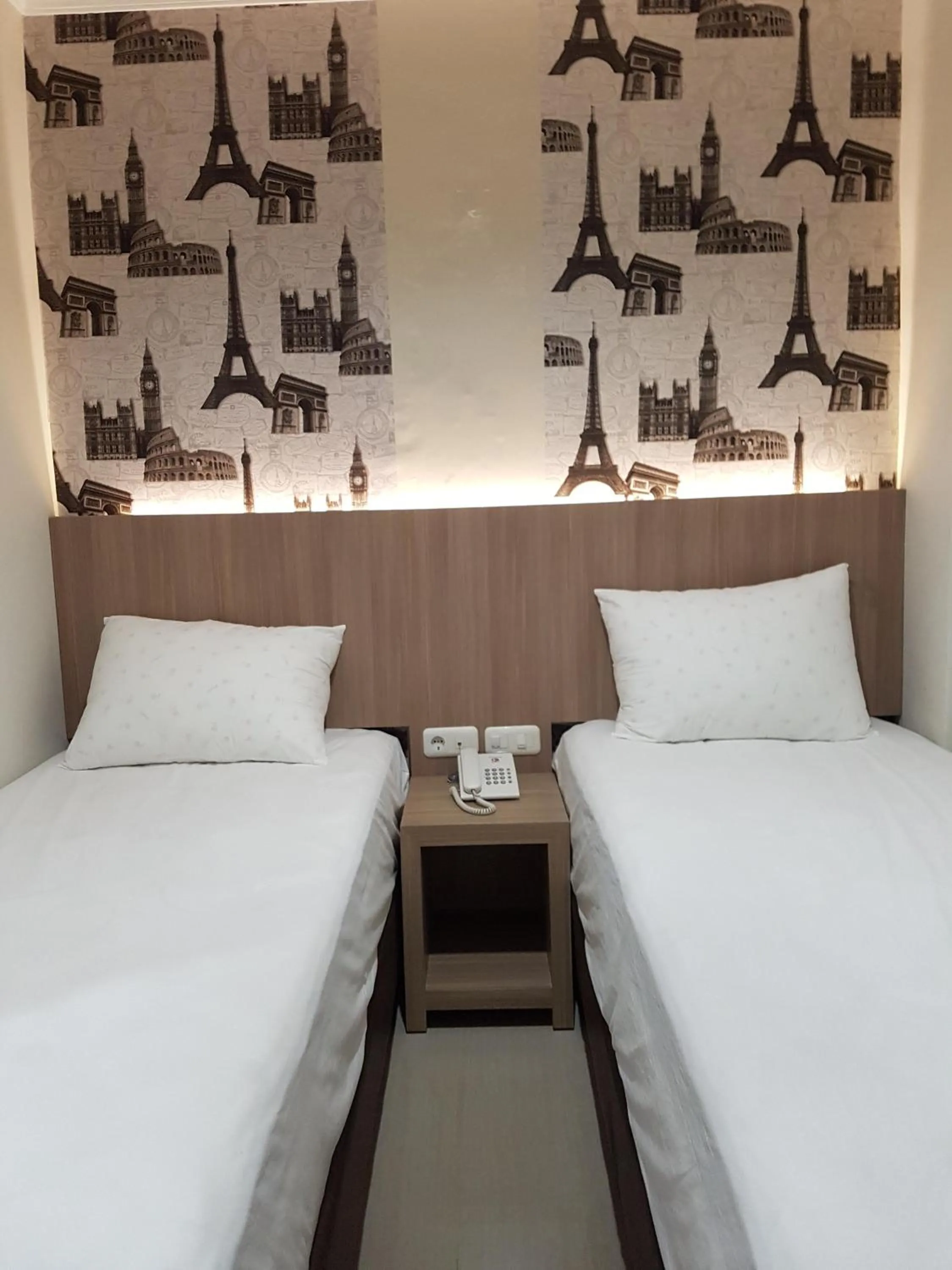 Bed in Ethan Hotel Kelapa Gading