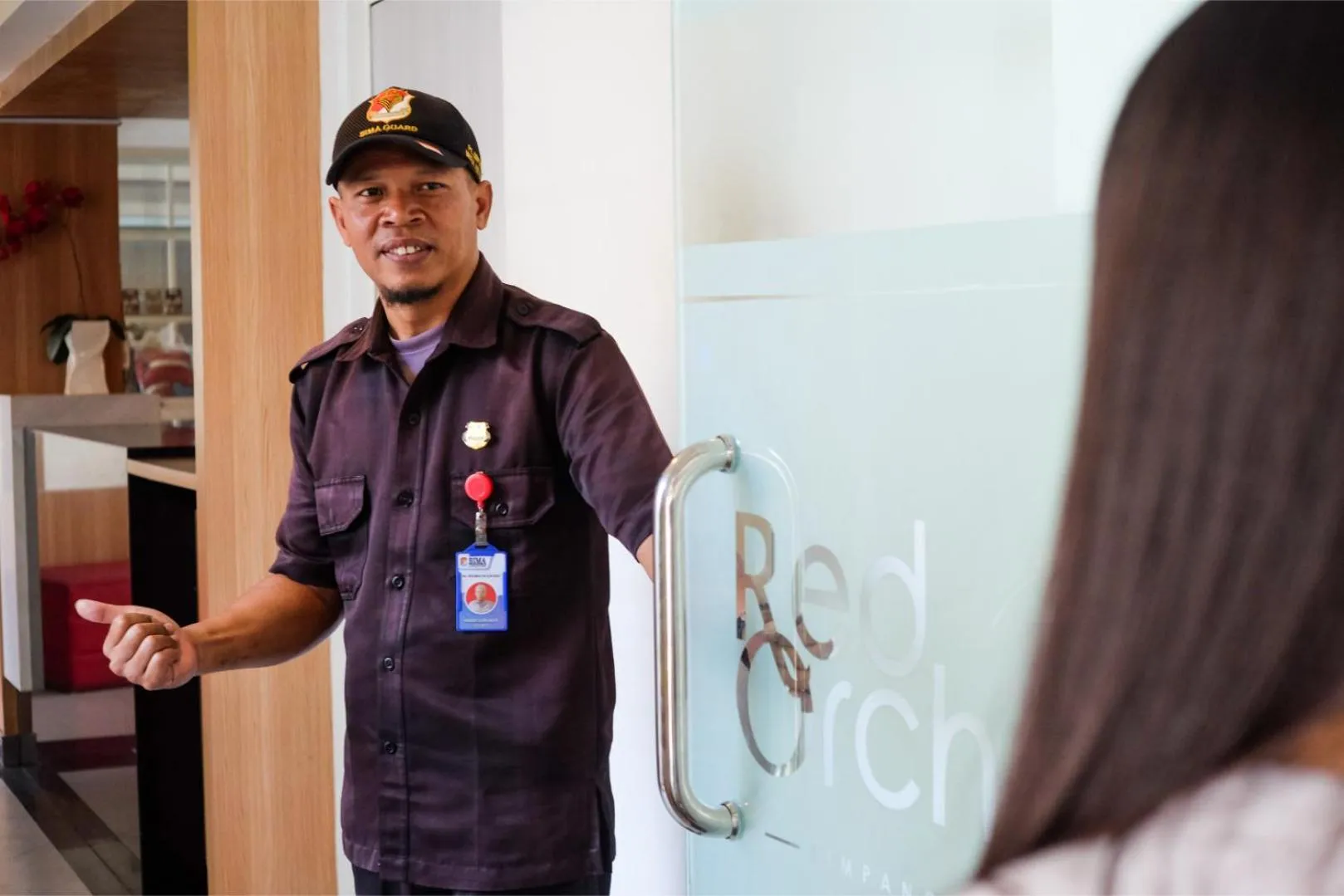 Staff in Red Orchid Hotel by Sajiwa