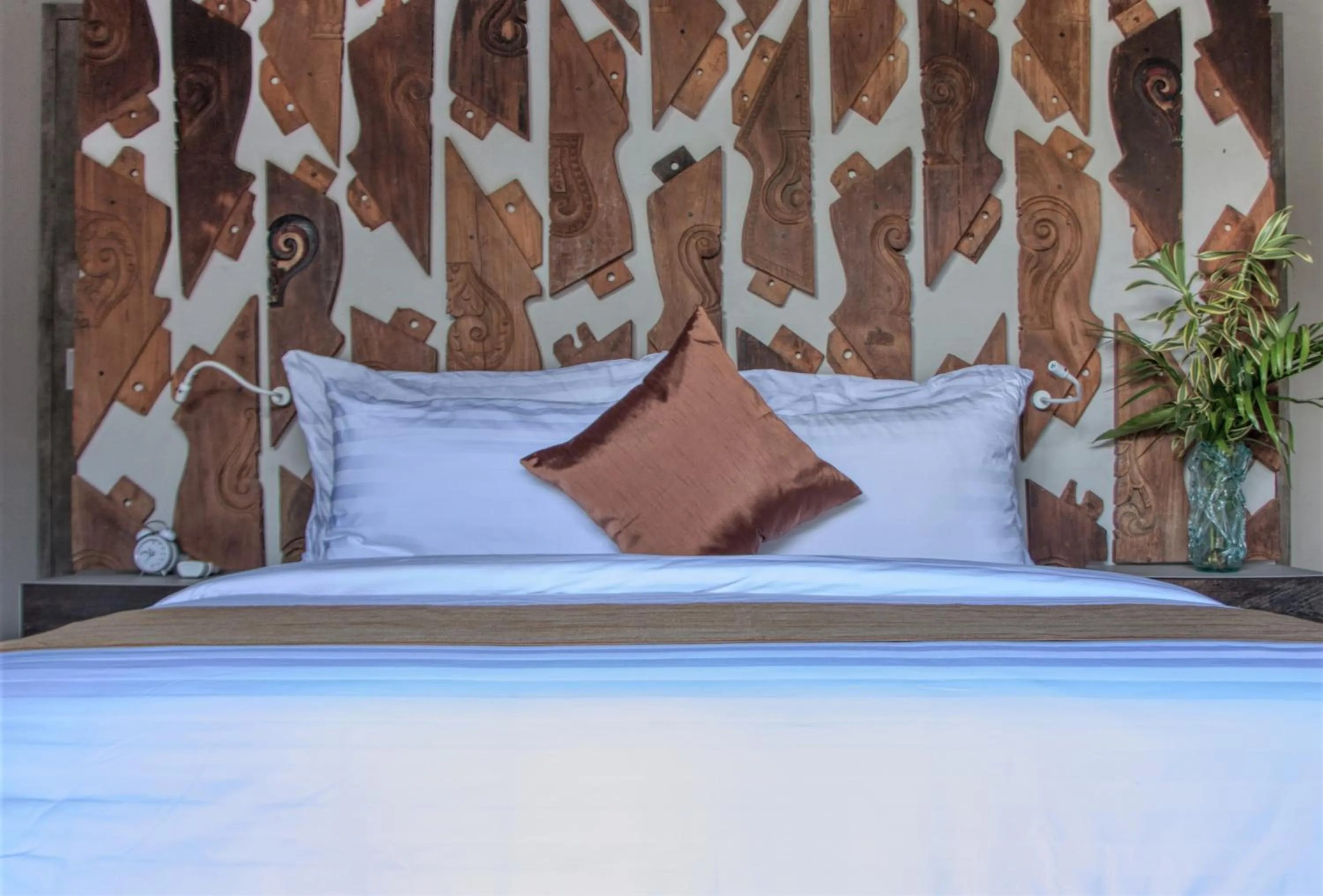 Bed in Pronoia Beach Resort