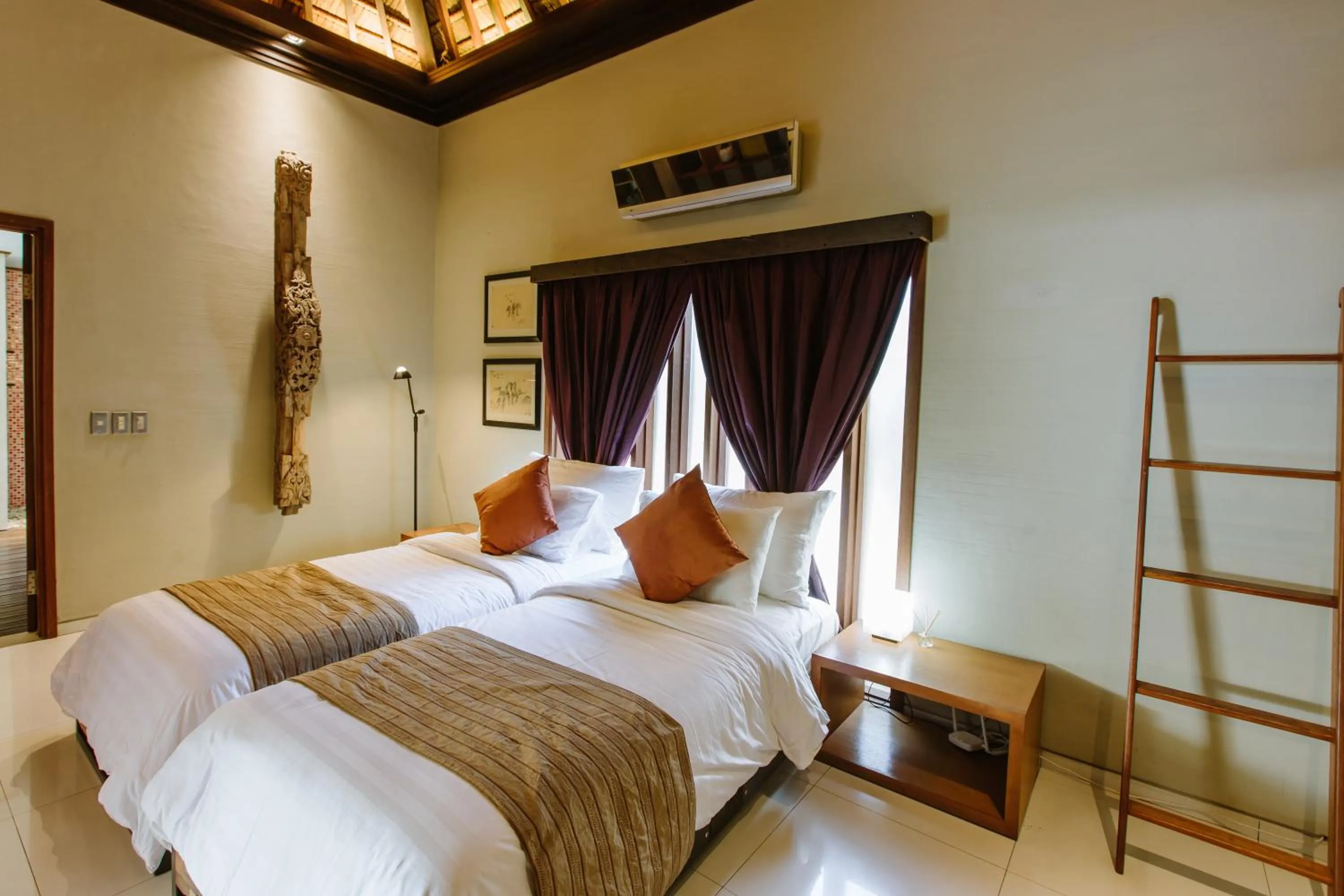 Bed in Pronoia Beach Resort