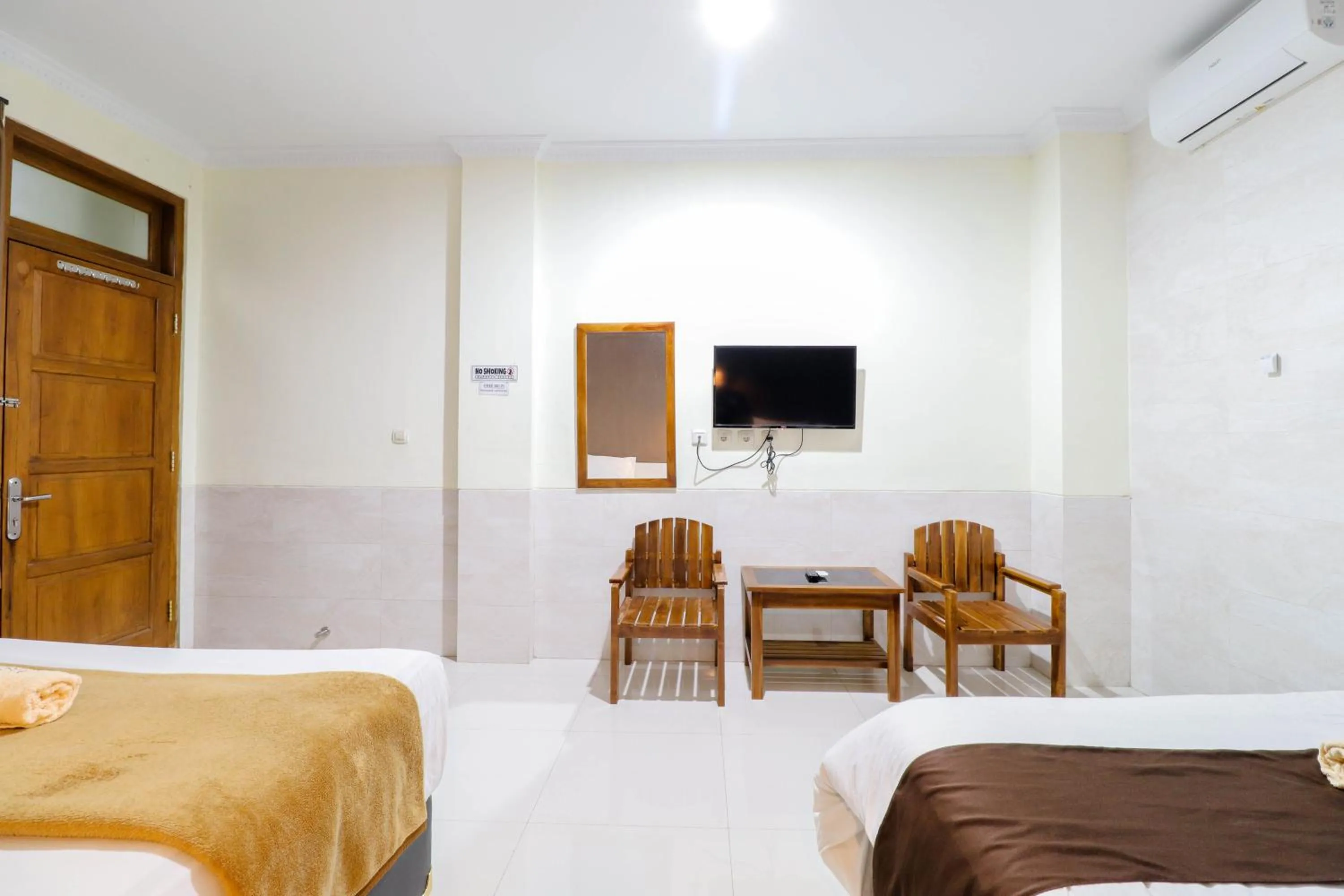 Bed in Hotel Safara Yogyakarta