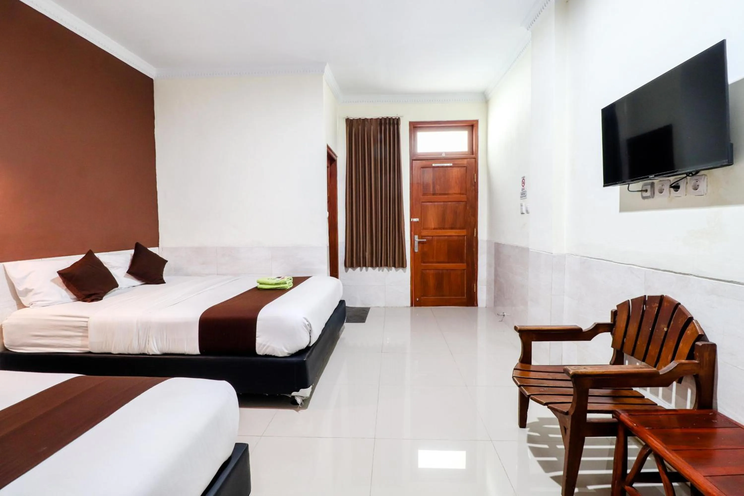 Bed in Hotel Safara Yogyakarta
