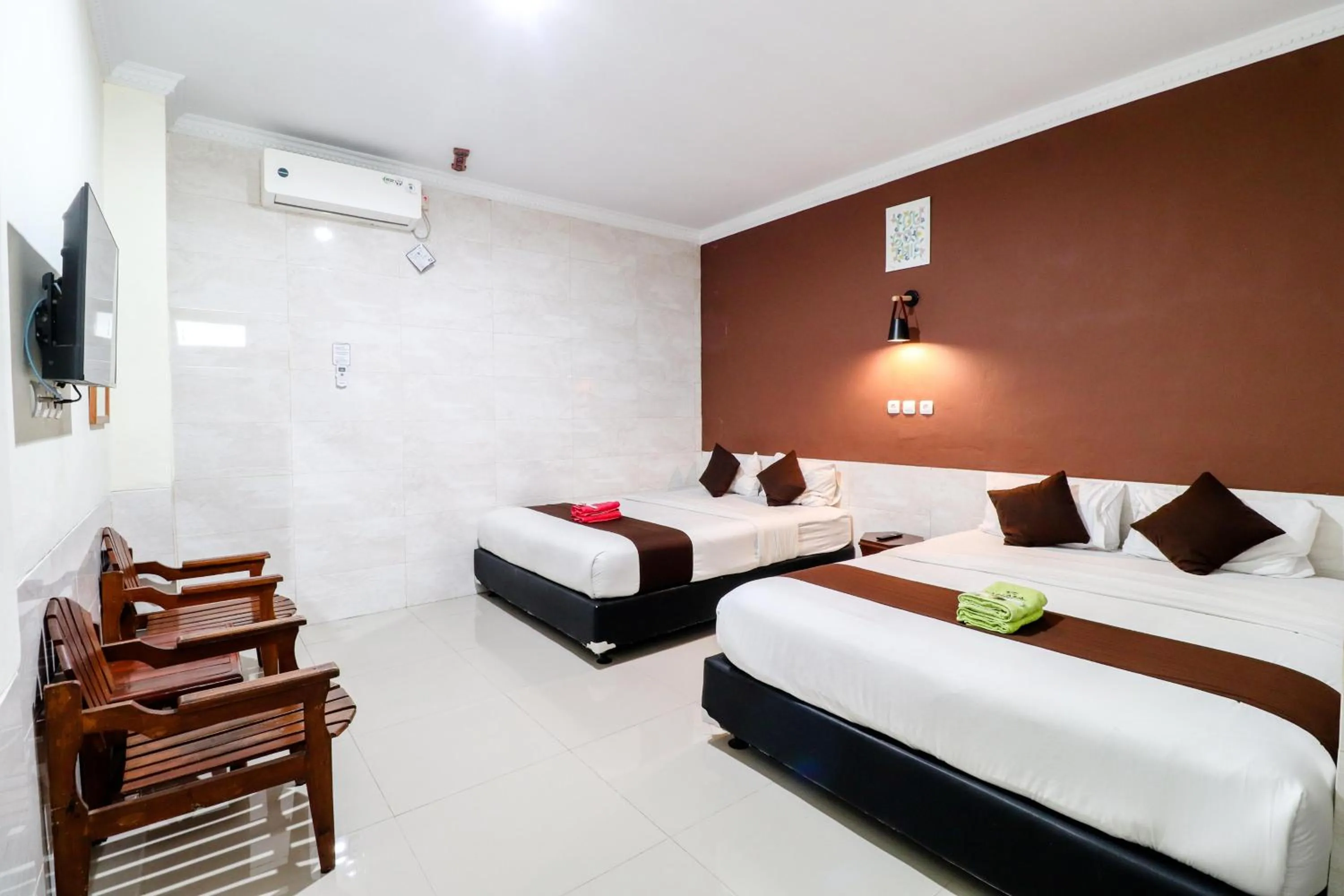 Bed in Hotel Safara Yogyakarta