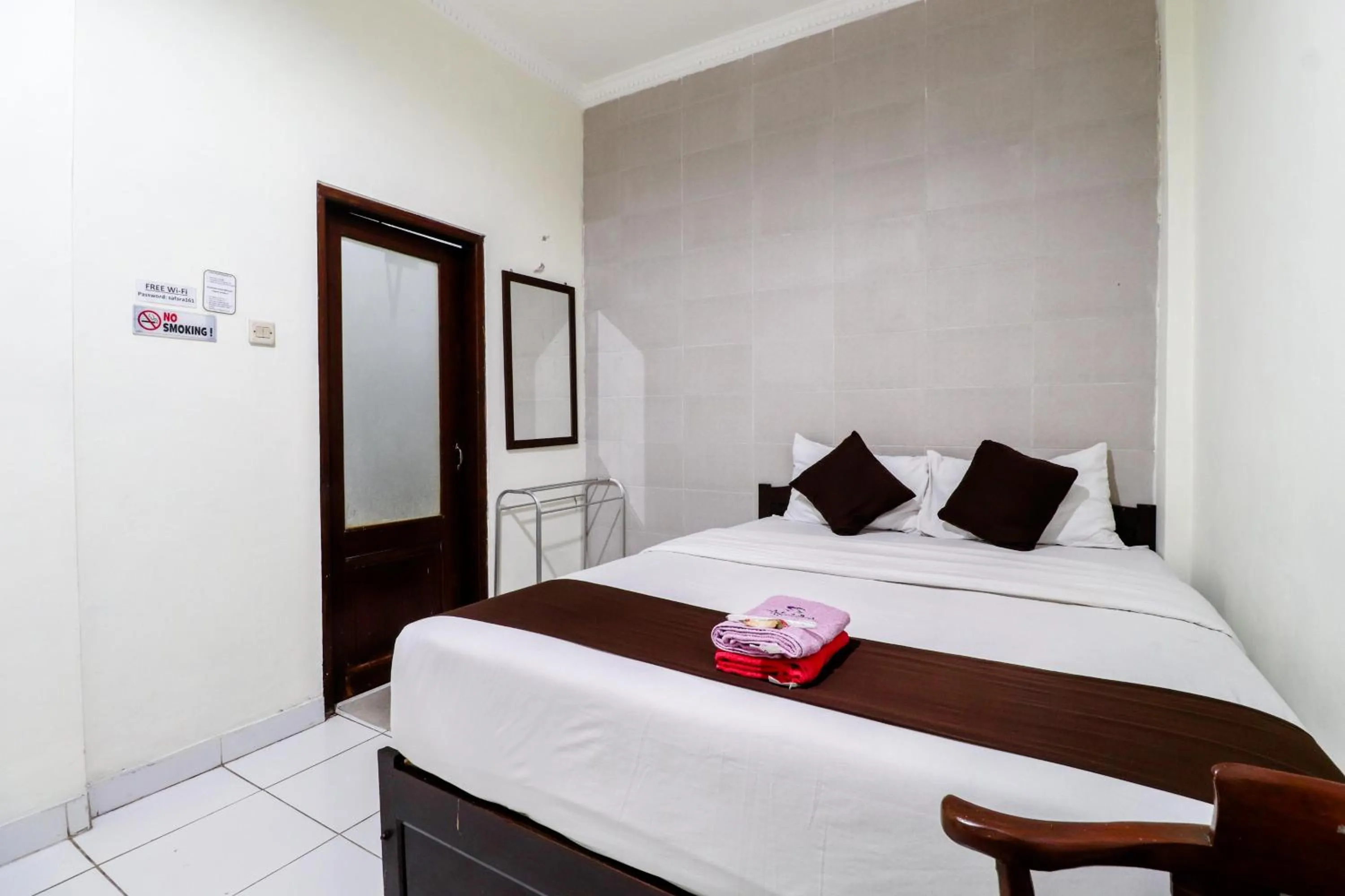 Bed in Hotel Safara Yogyakarta