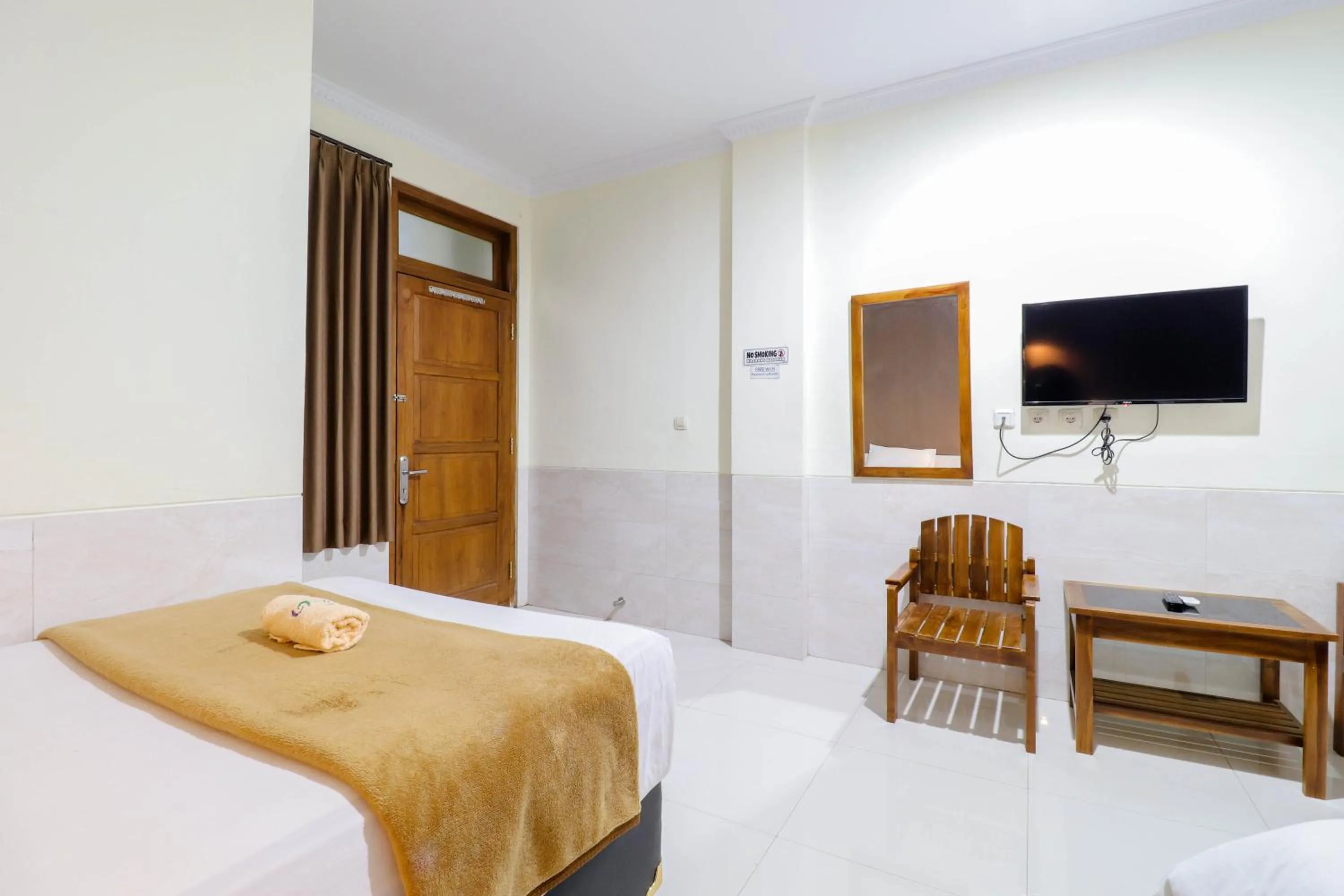 Bed in Hotel Safara Yogyakarta