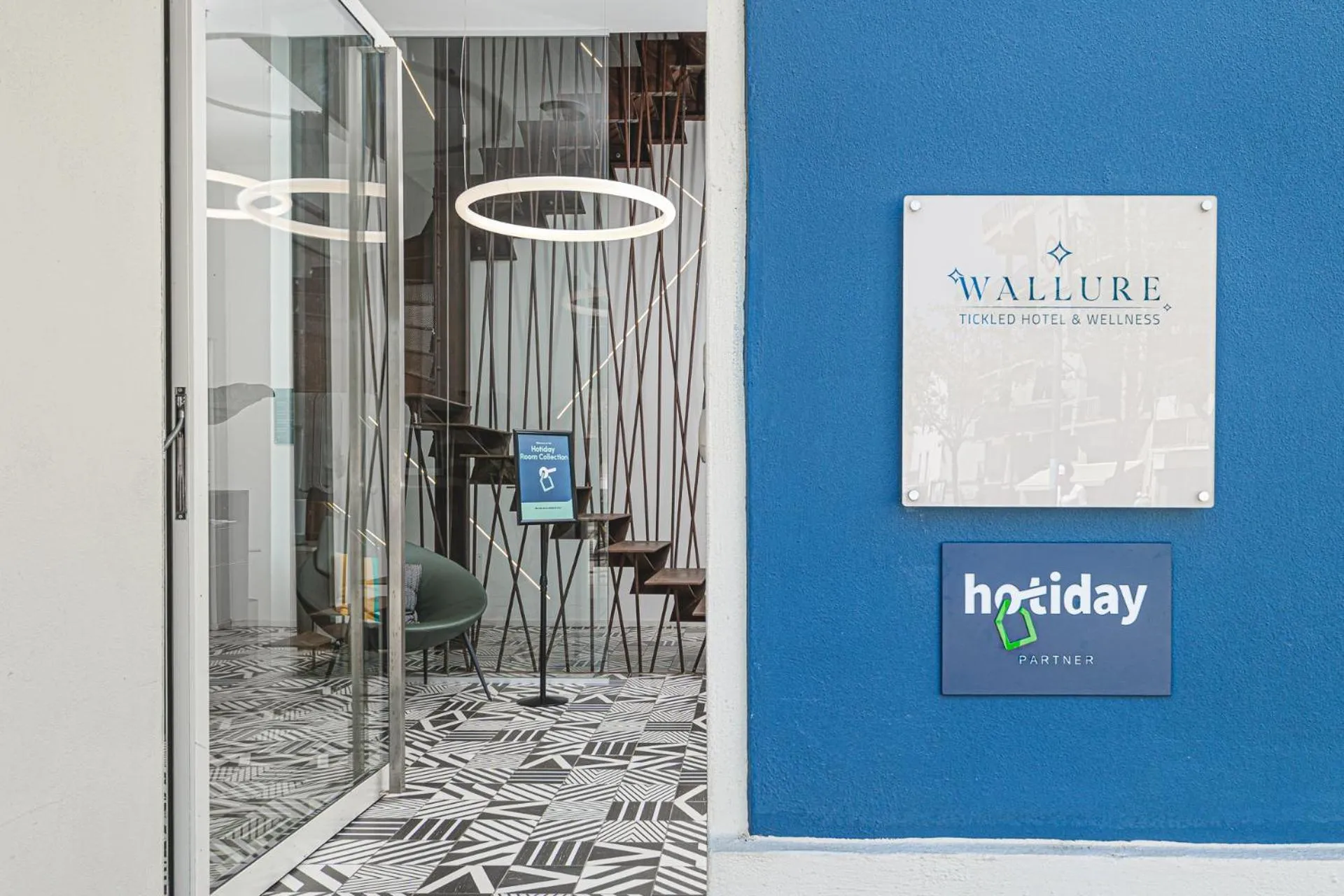 Property logo or sign in HOTIDAY Olbia Wallure