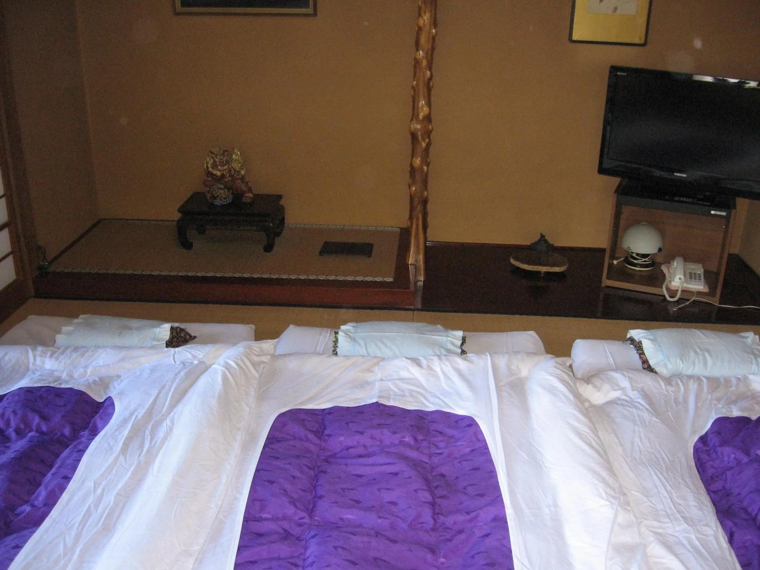 Bed in Maruka Ryokan