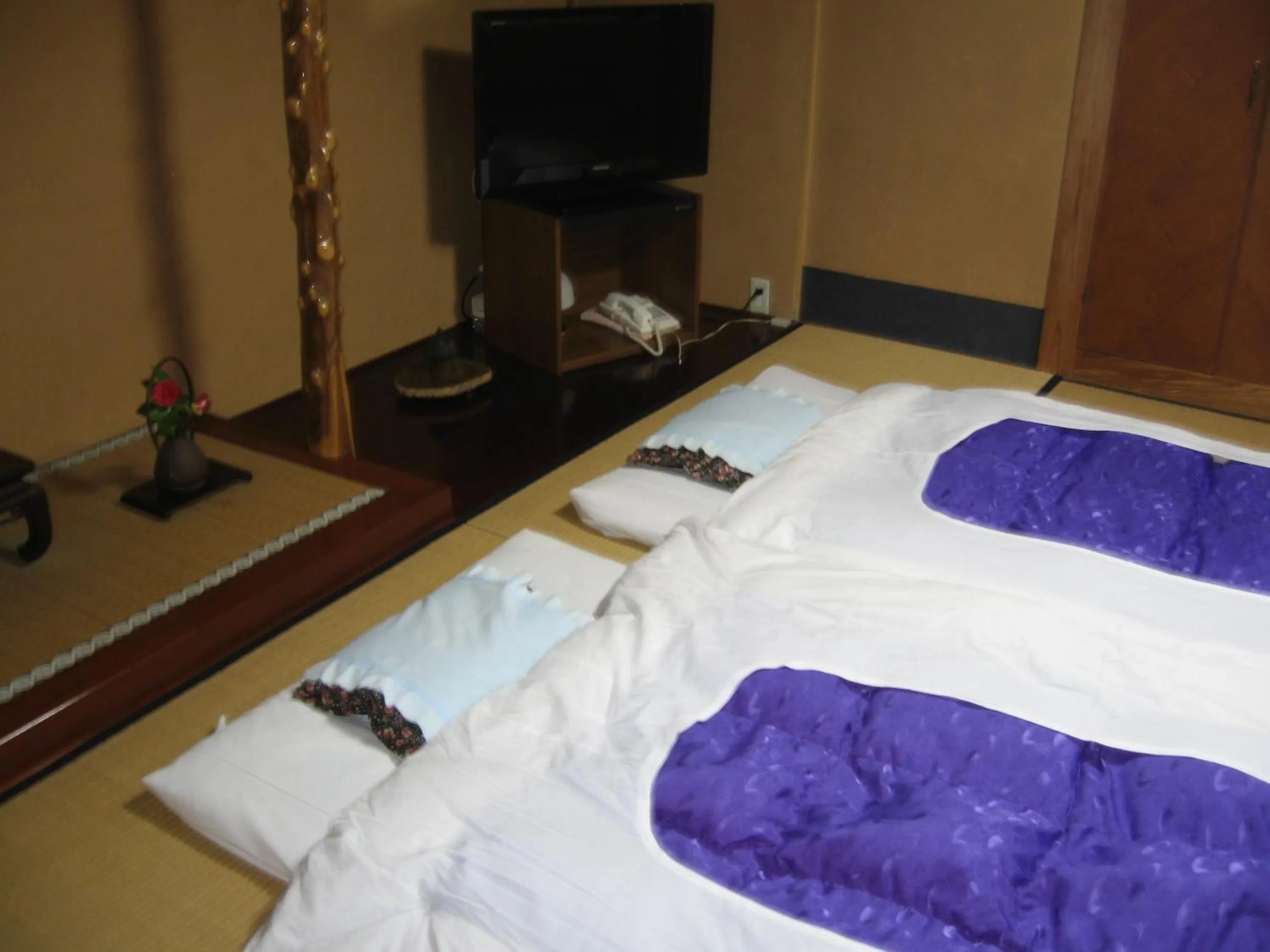 Bed in Maruka Ryokan