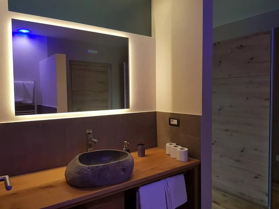 Bathroom in Aparthotel Malga