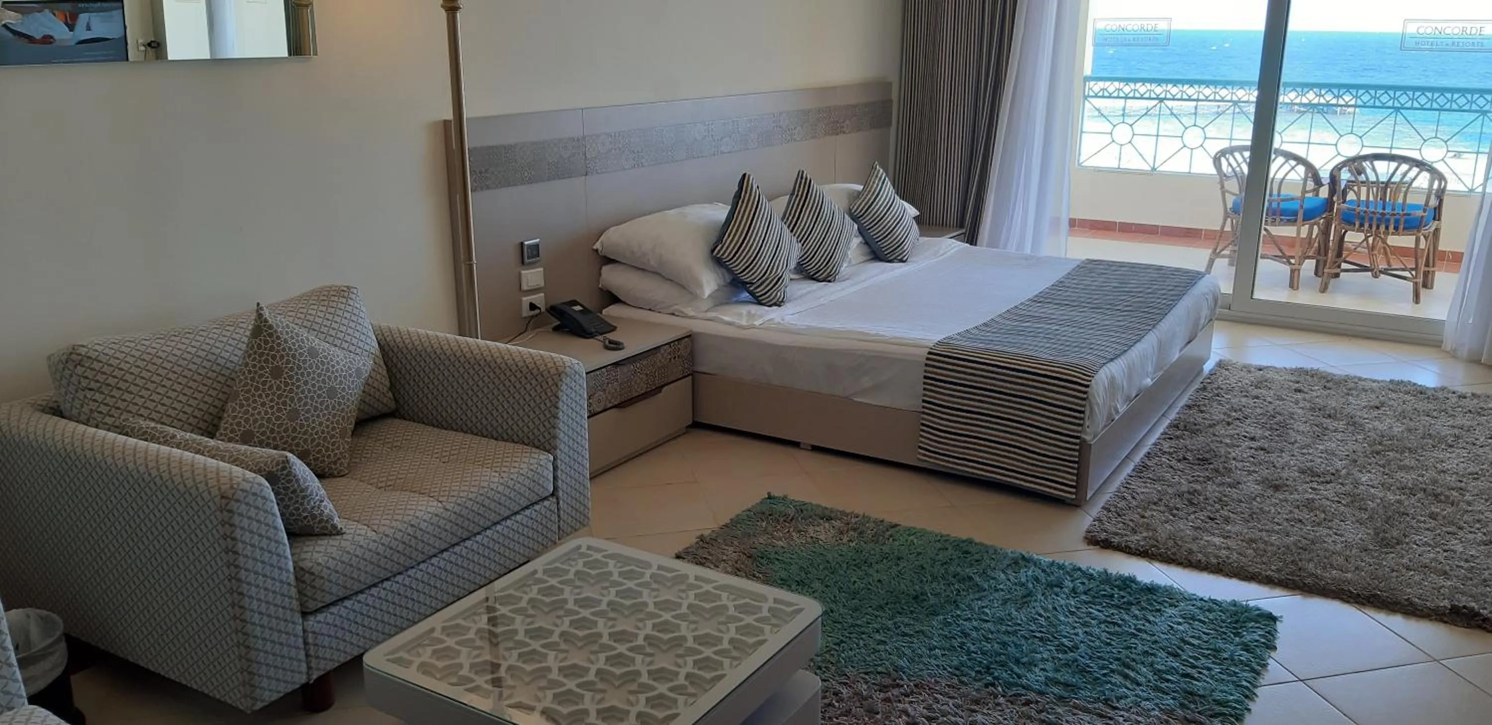 Seating area, Bed in Concorde Moreen Beach Resort