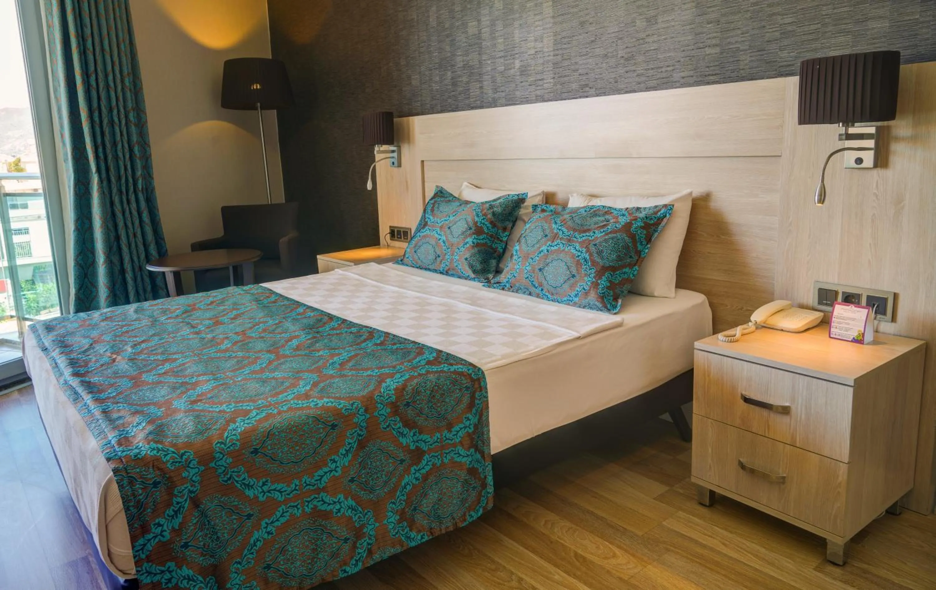 Bed in Parador Beach Hotel All Inclusive