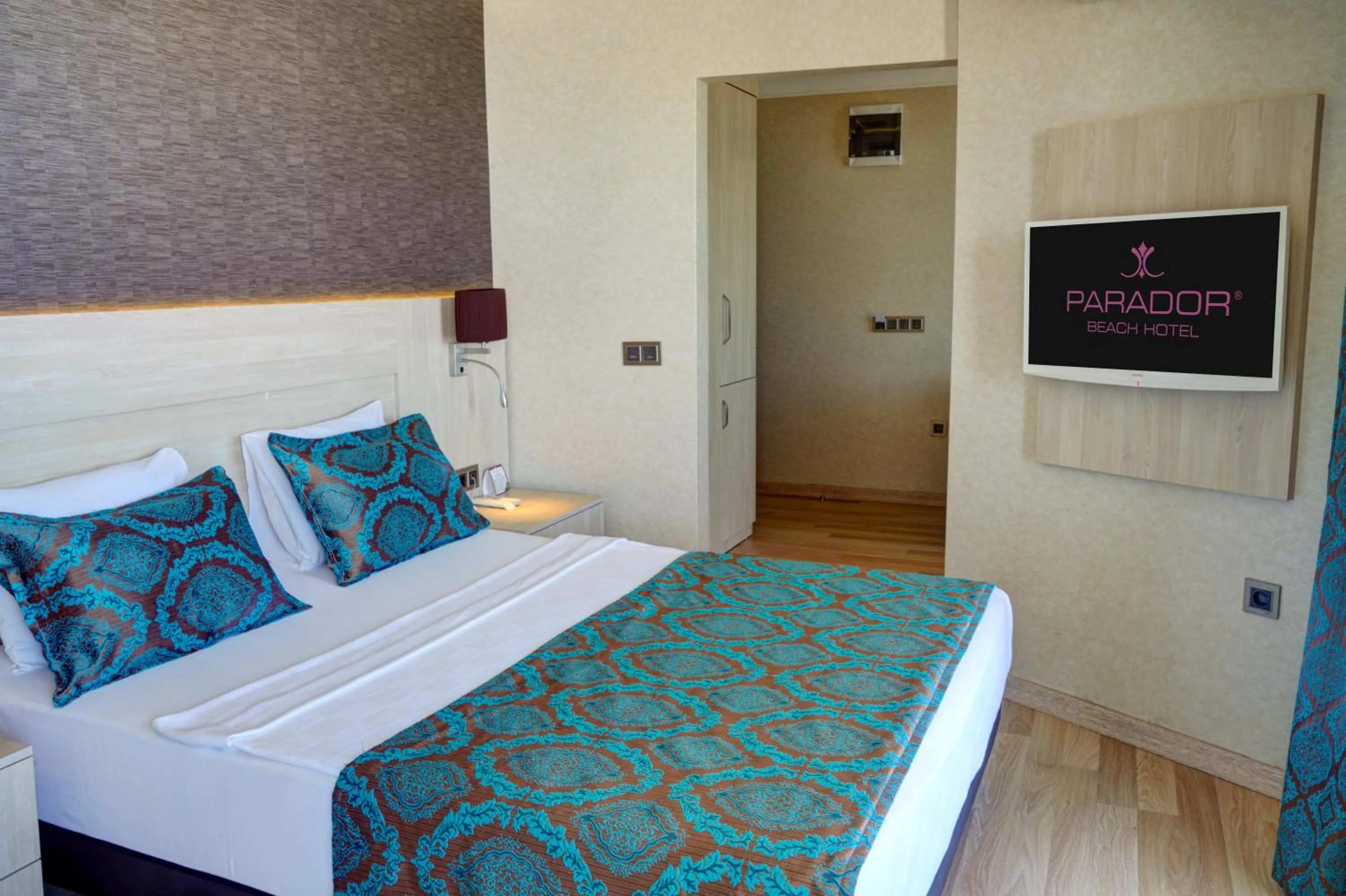 Bed in Parador Beach Hotel All Inclusive