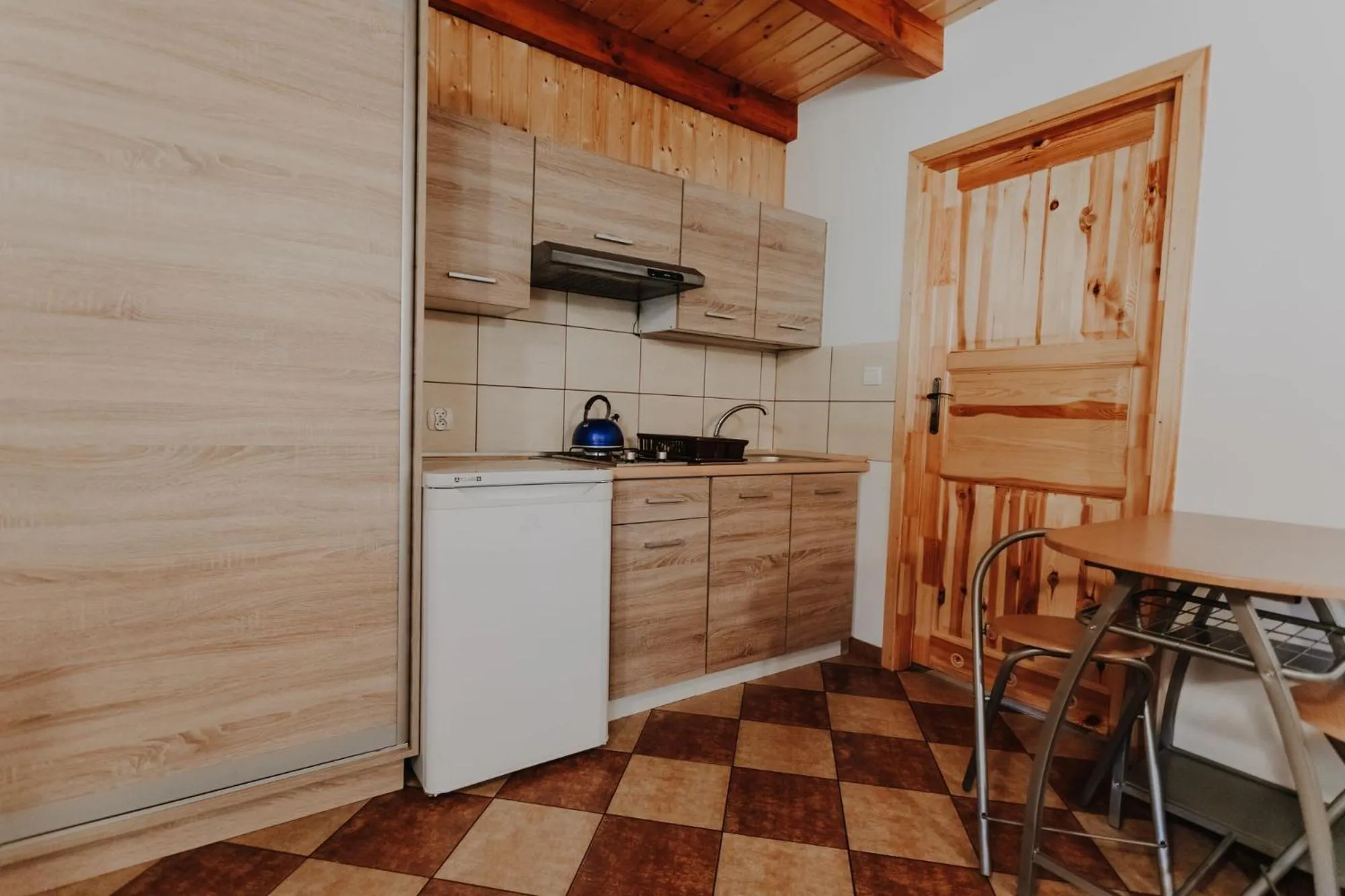 Kitchen or kitchenette in Domki Ania