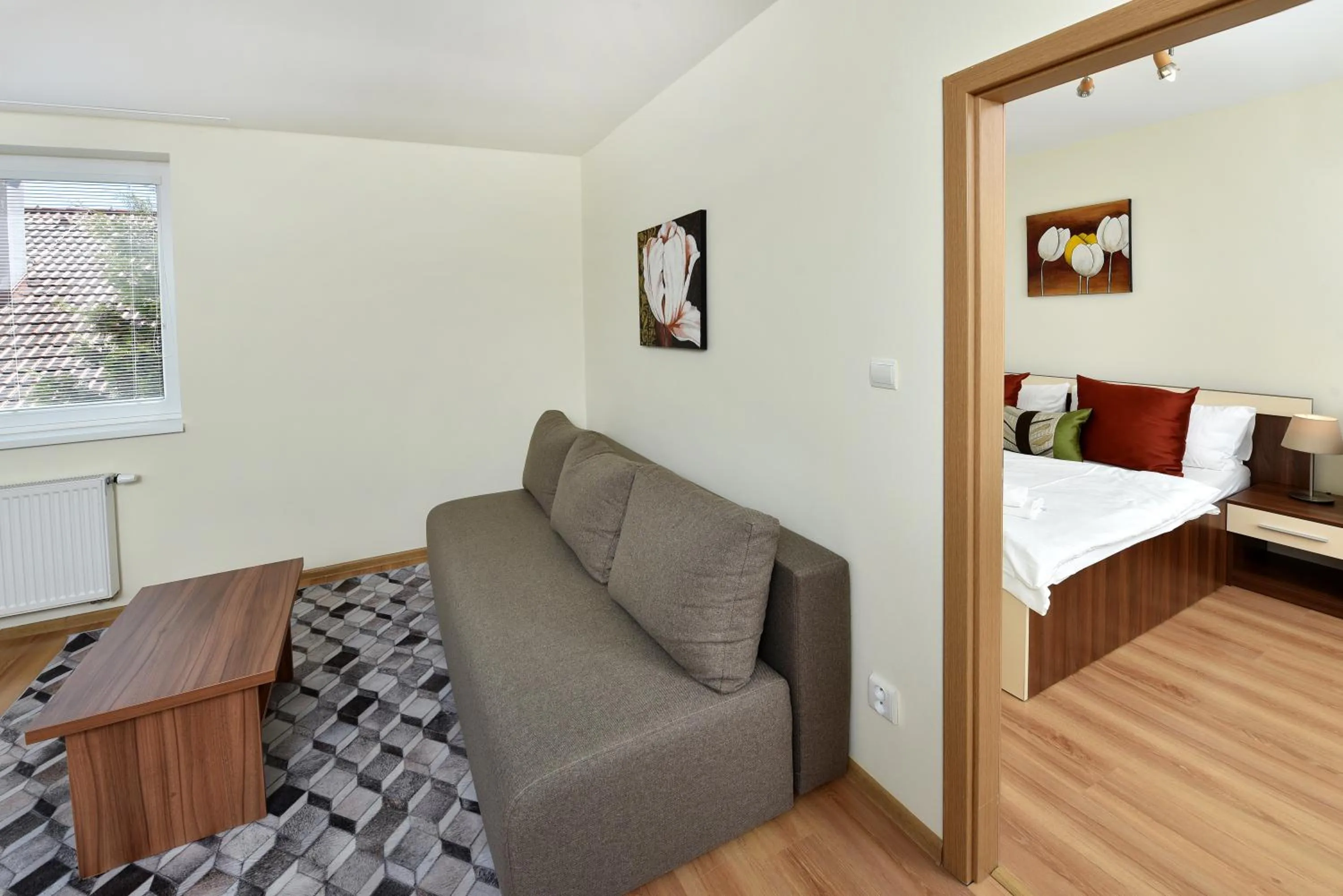 Living room, Bed in APLEND Vila Júlia