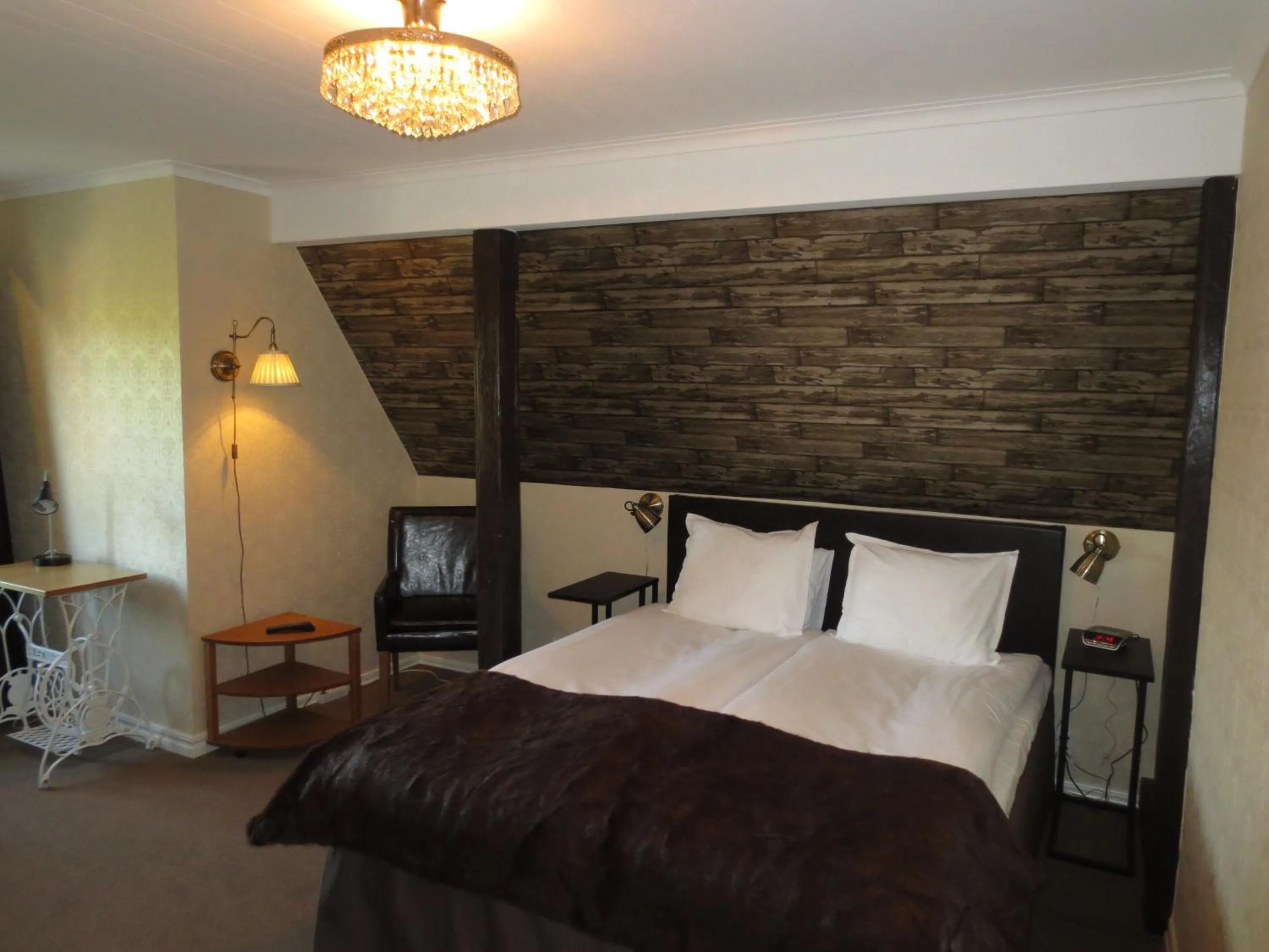 Seating area, Bed in Hotell S:t Olof