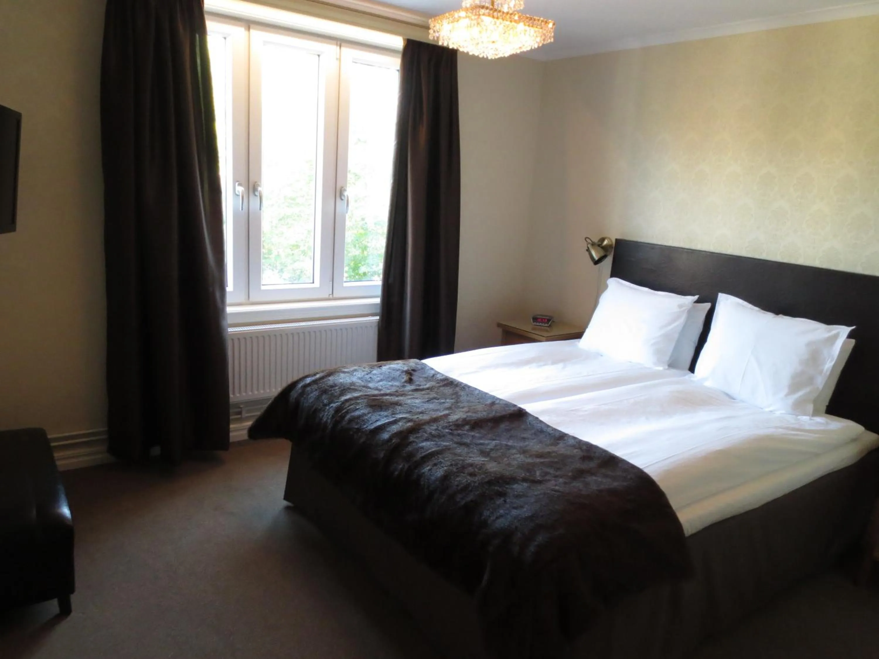 Photo of the whole room, Bed in Hotell S:t Olof