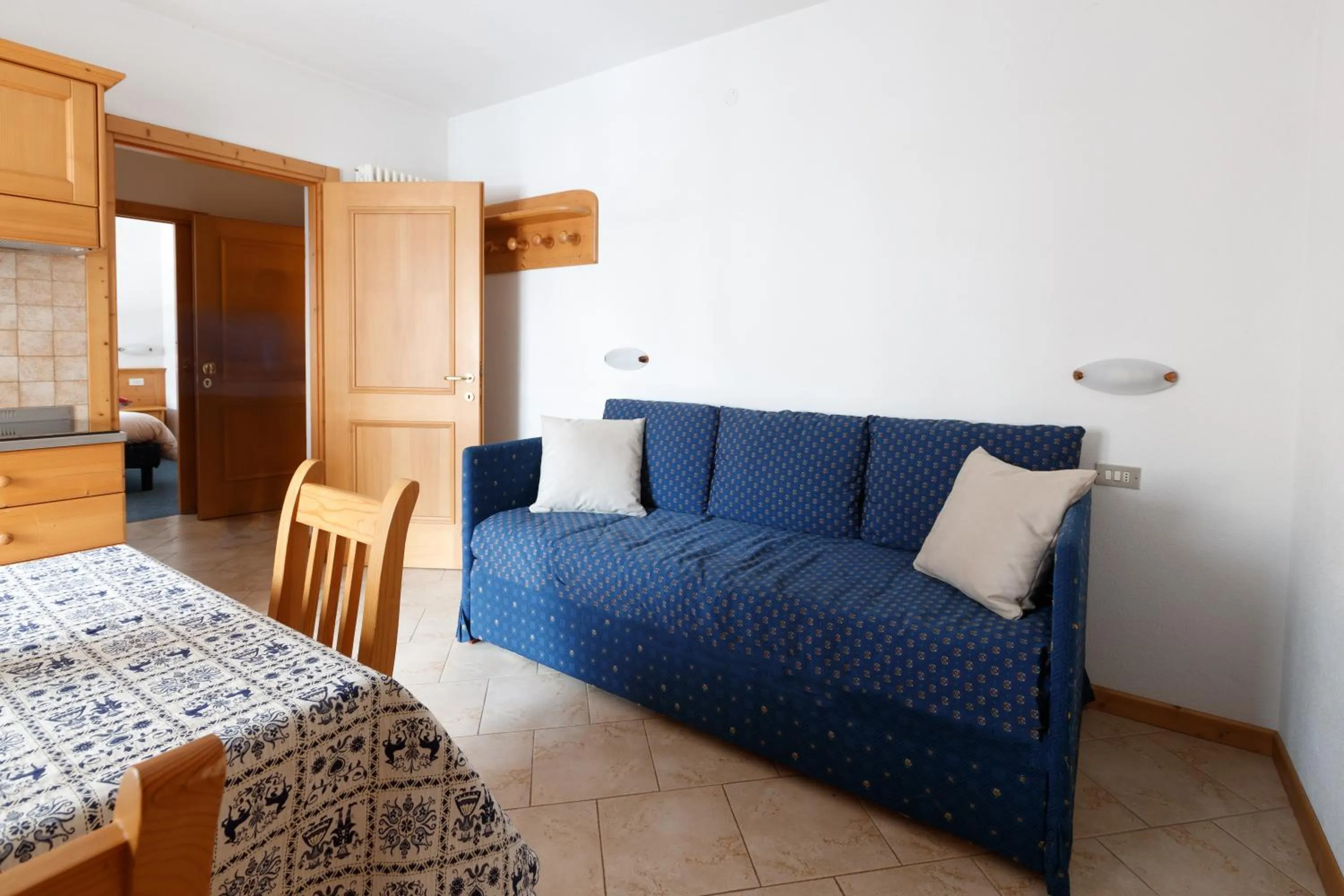 Living room, Bed in Residence Sci Sport