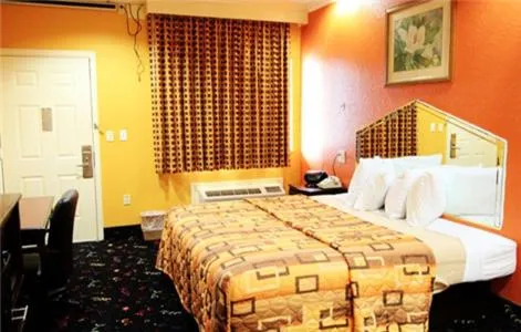 Bed in Executive inn Bacliff