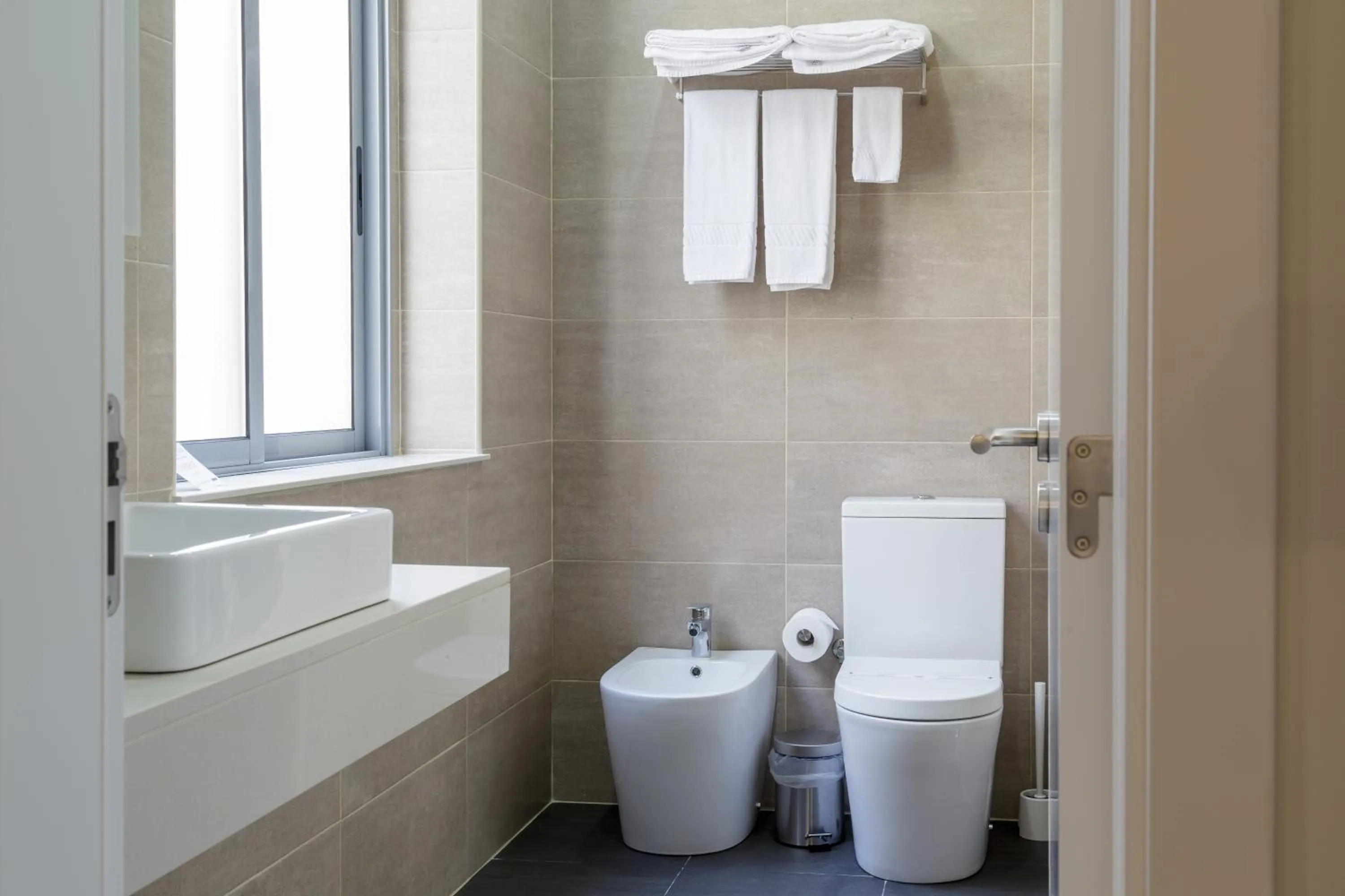 Bathroom in Porto Domus Hotel