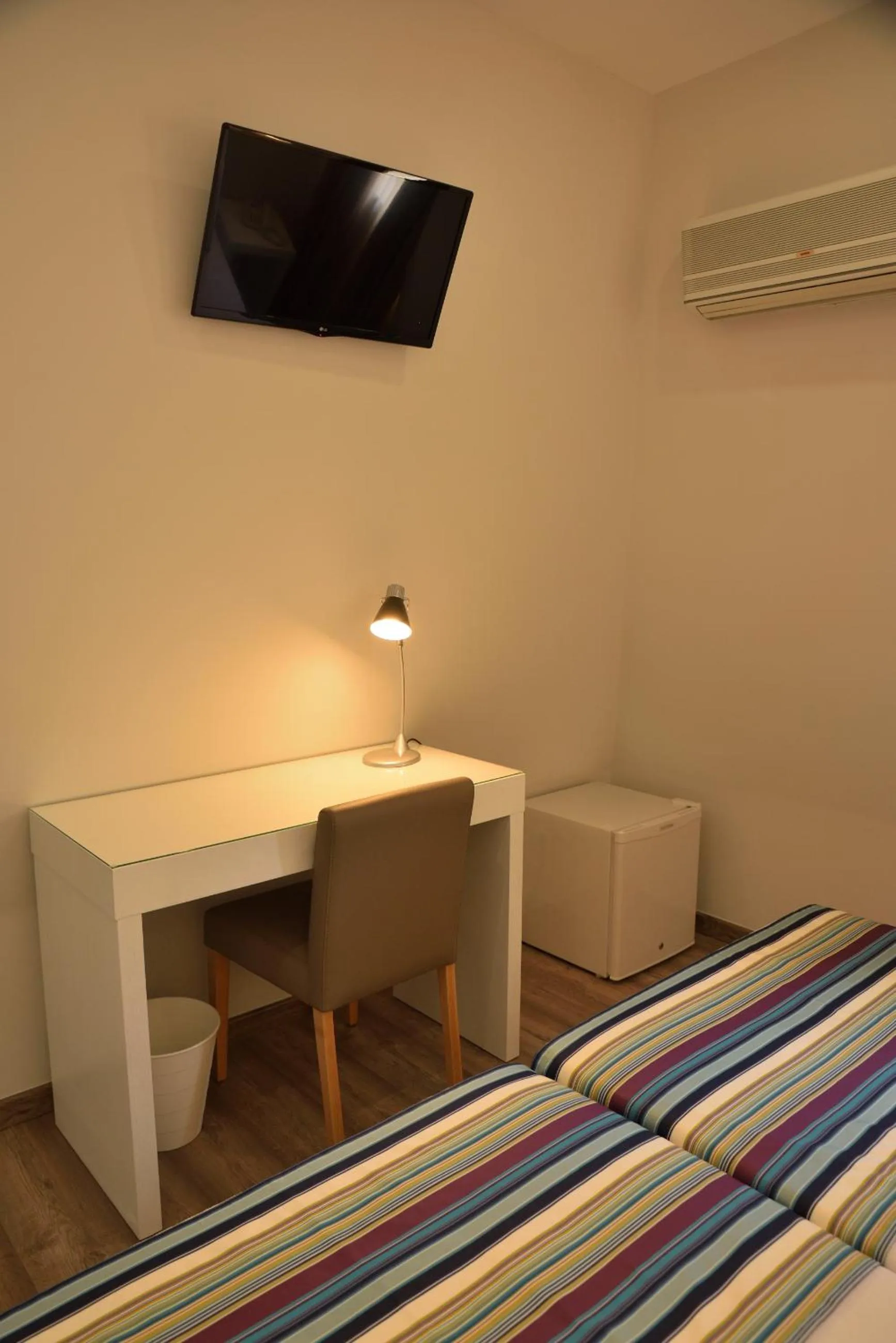 Bedroom in Porto Domus Hotel