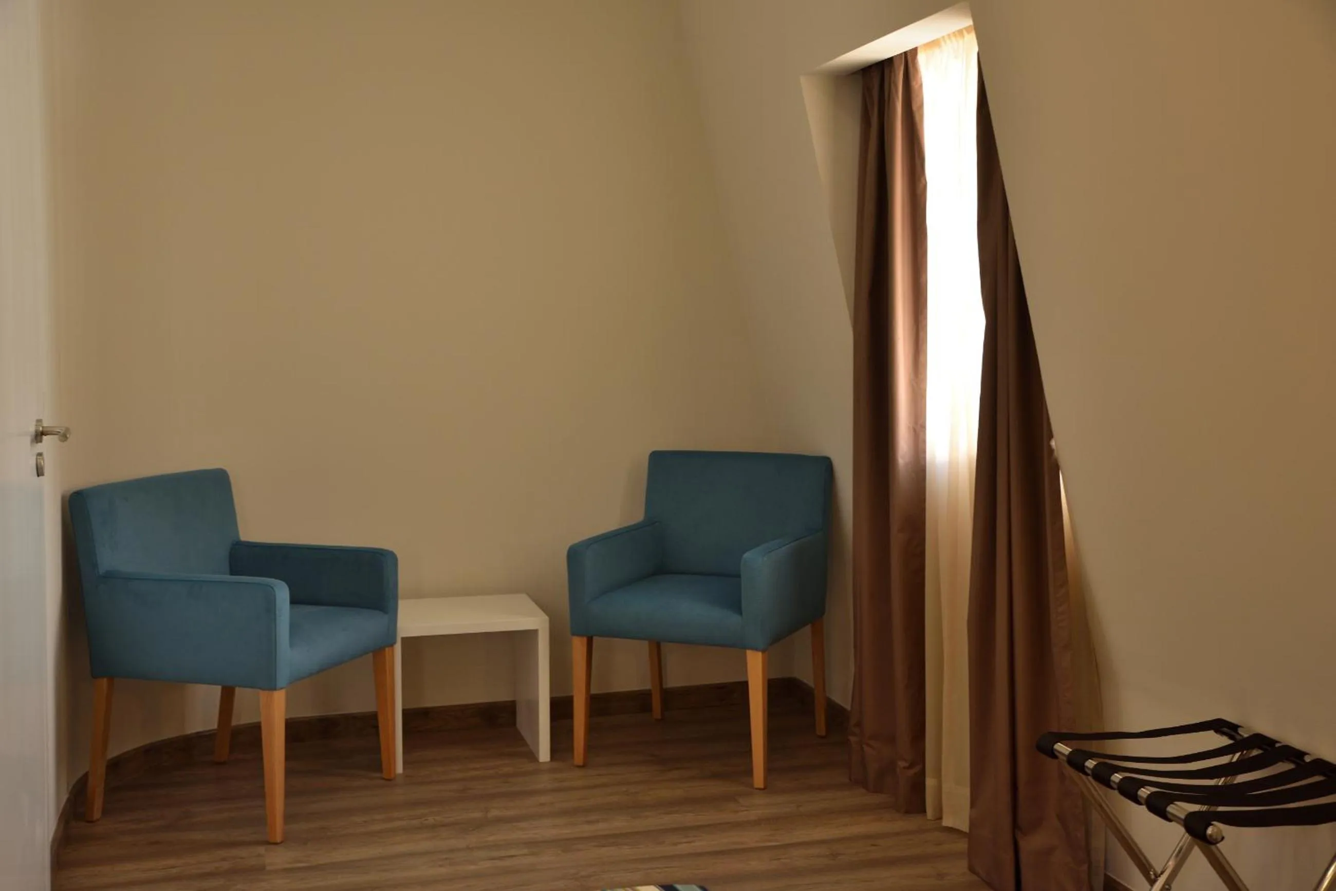 Bedroom in Porto Domus Hotel