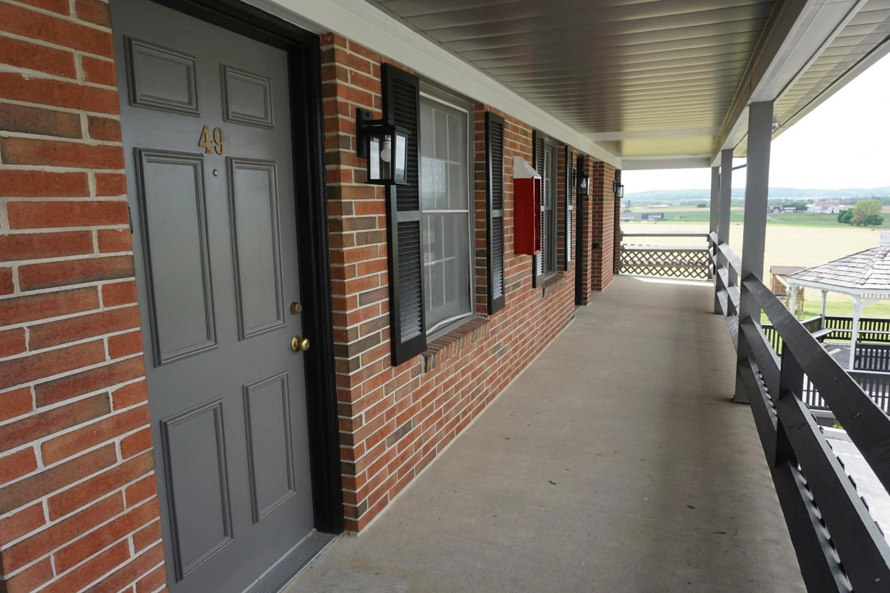 Balcony/Terrace in Harvest Drive Family Inn - Renovated Rooms