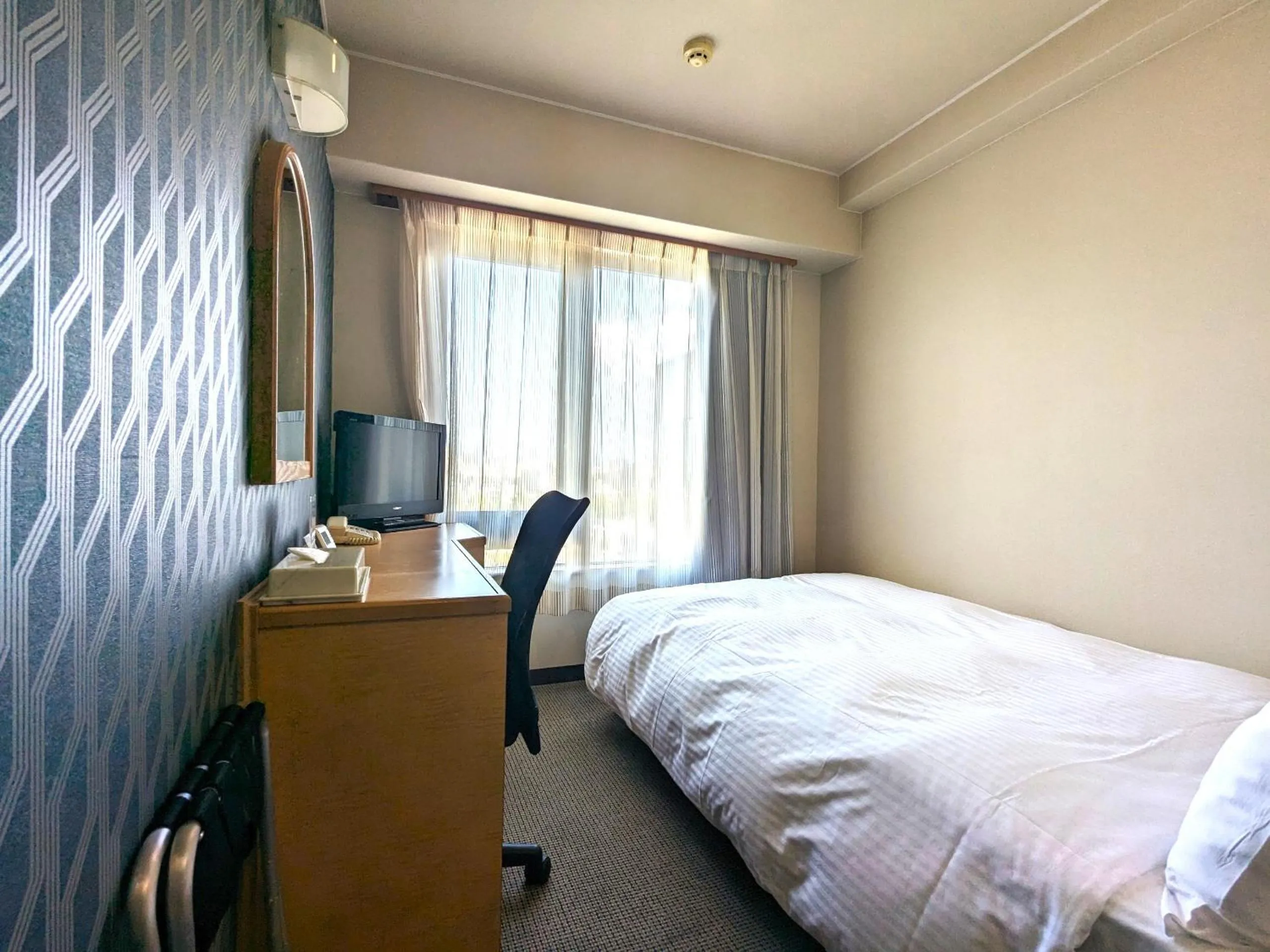 Photo of the whole room, Bed in Kenchomae Green Hotel