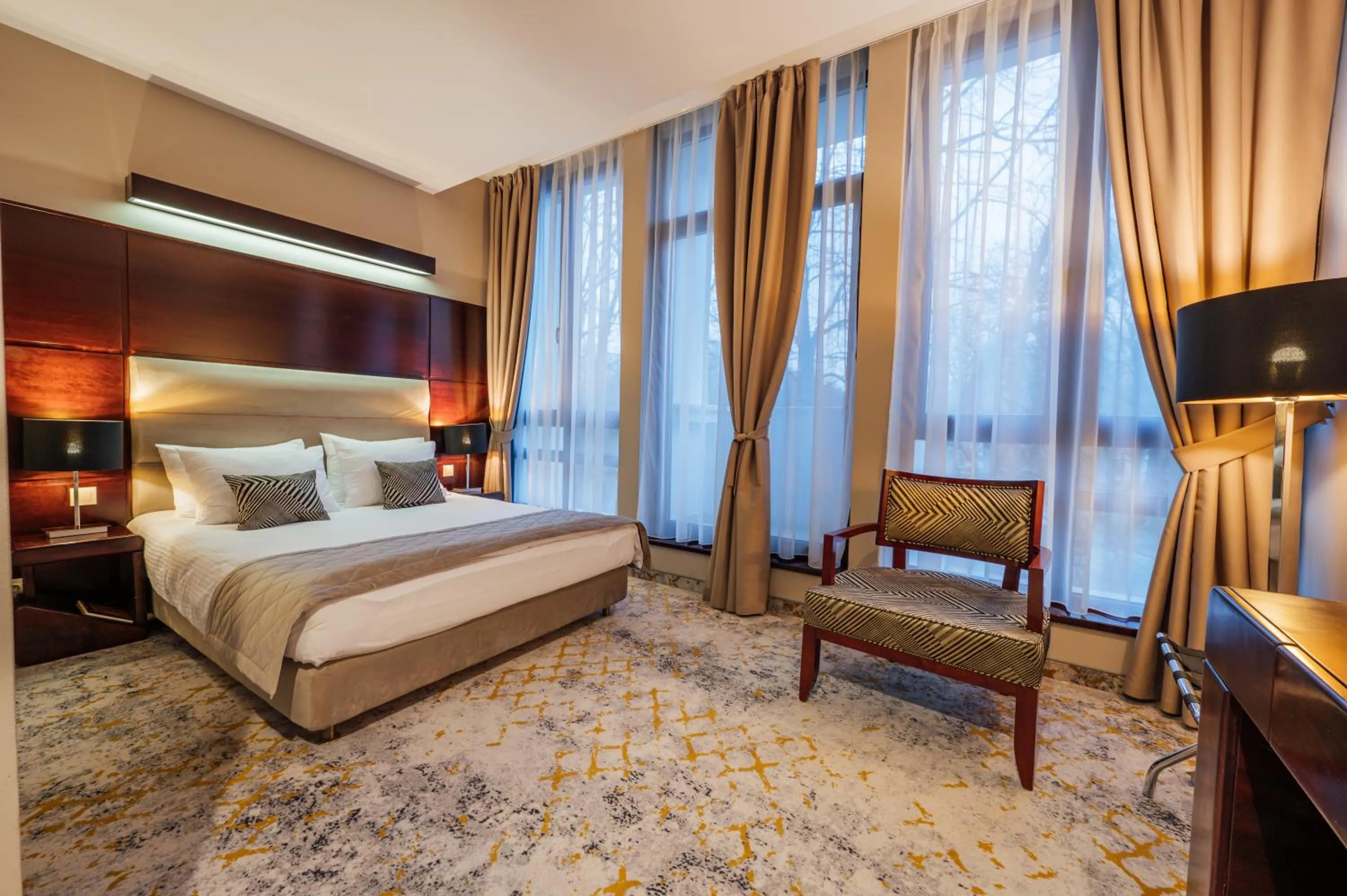 Bed in L`Art Hotel Carei