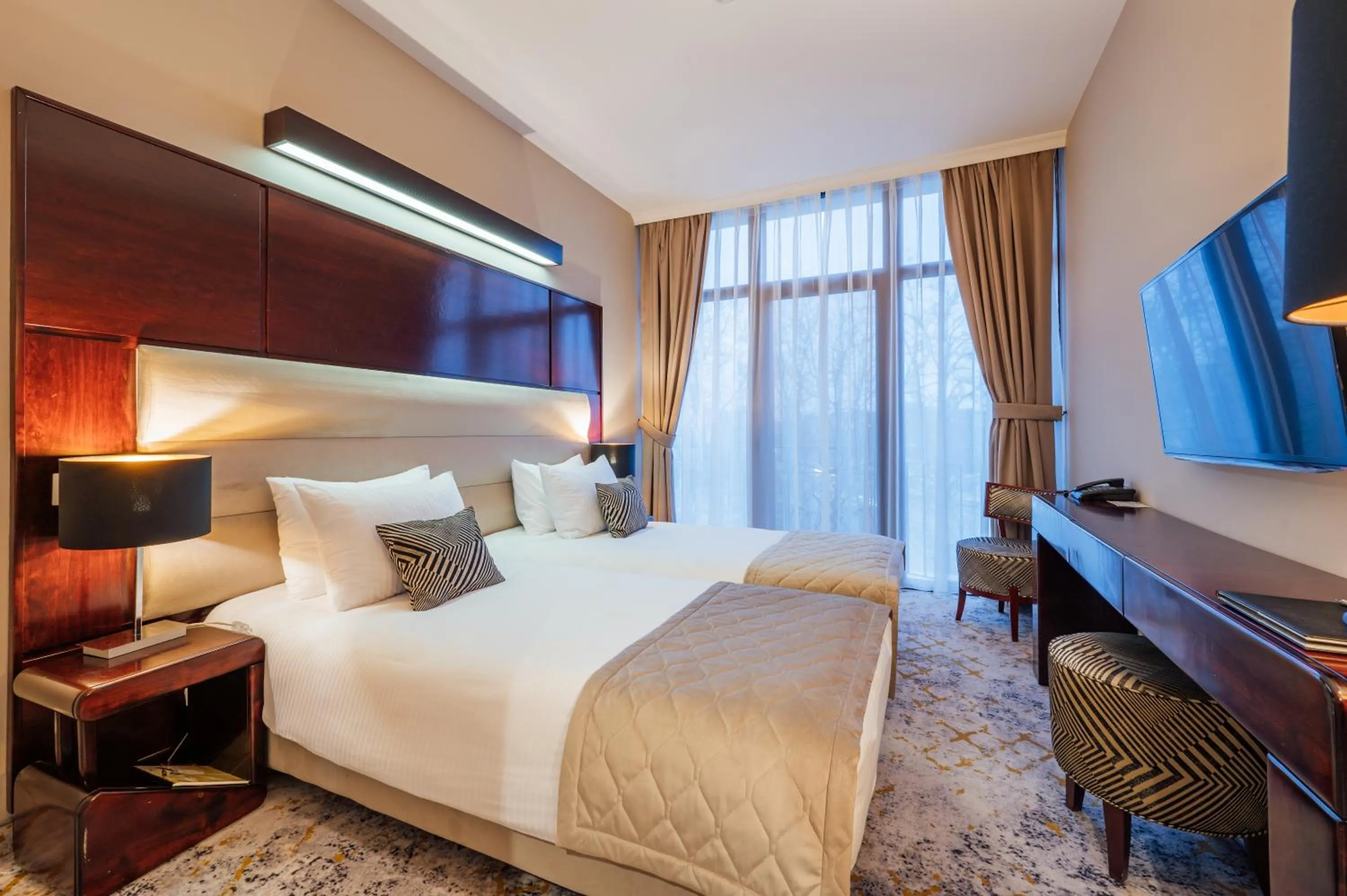 Bed in L`Art Hotel Carei