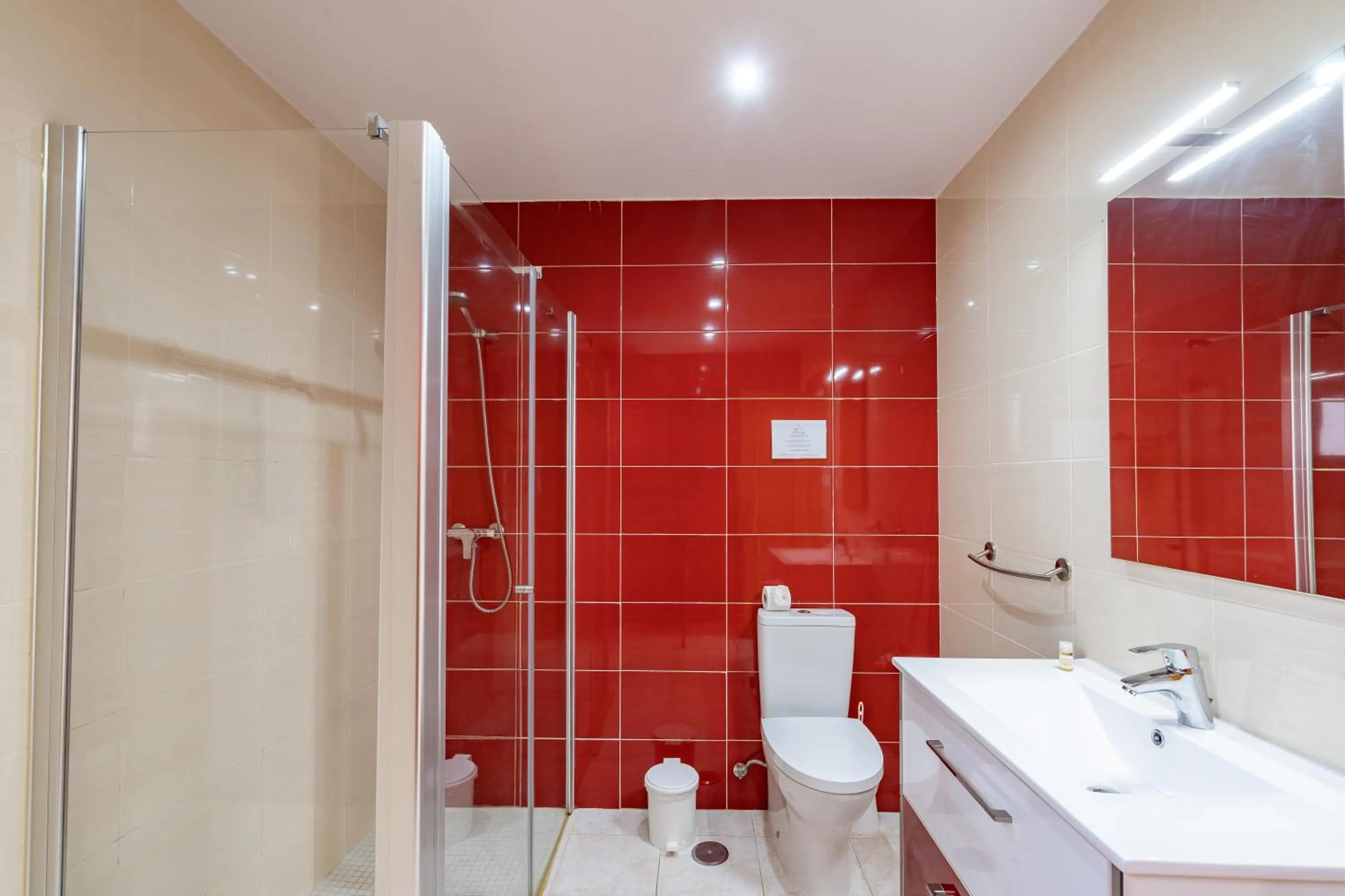 Shower in Apartamentos Vale de Carros by Umbral