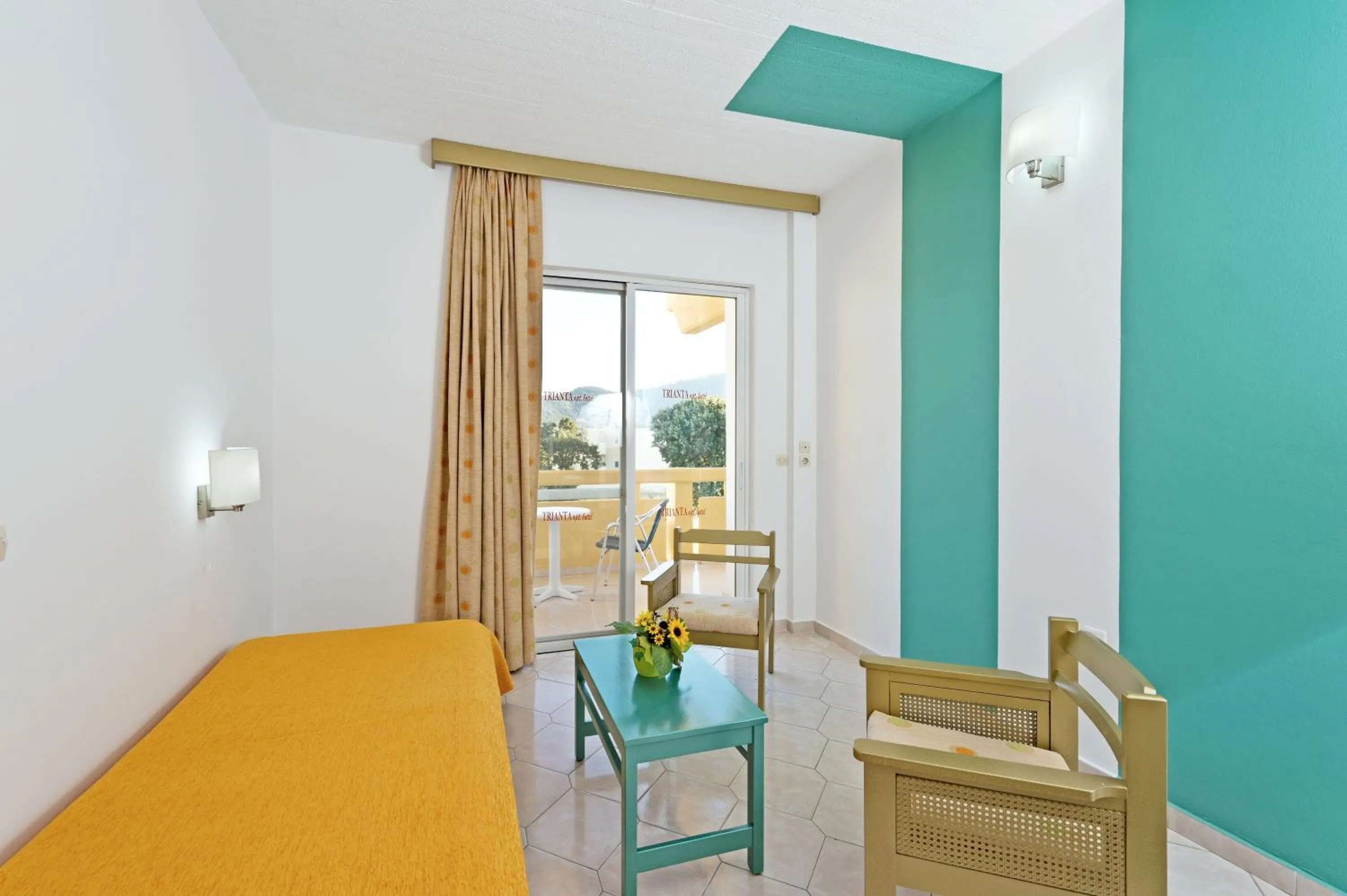 Bed in Trianta Hotel Apartments