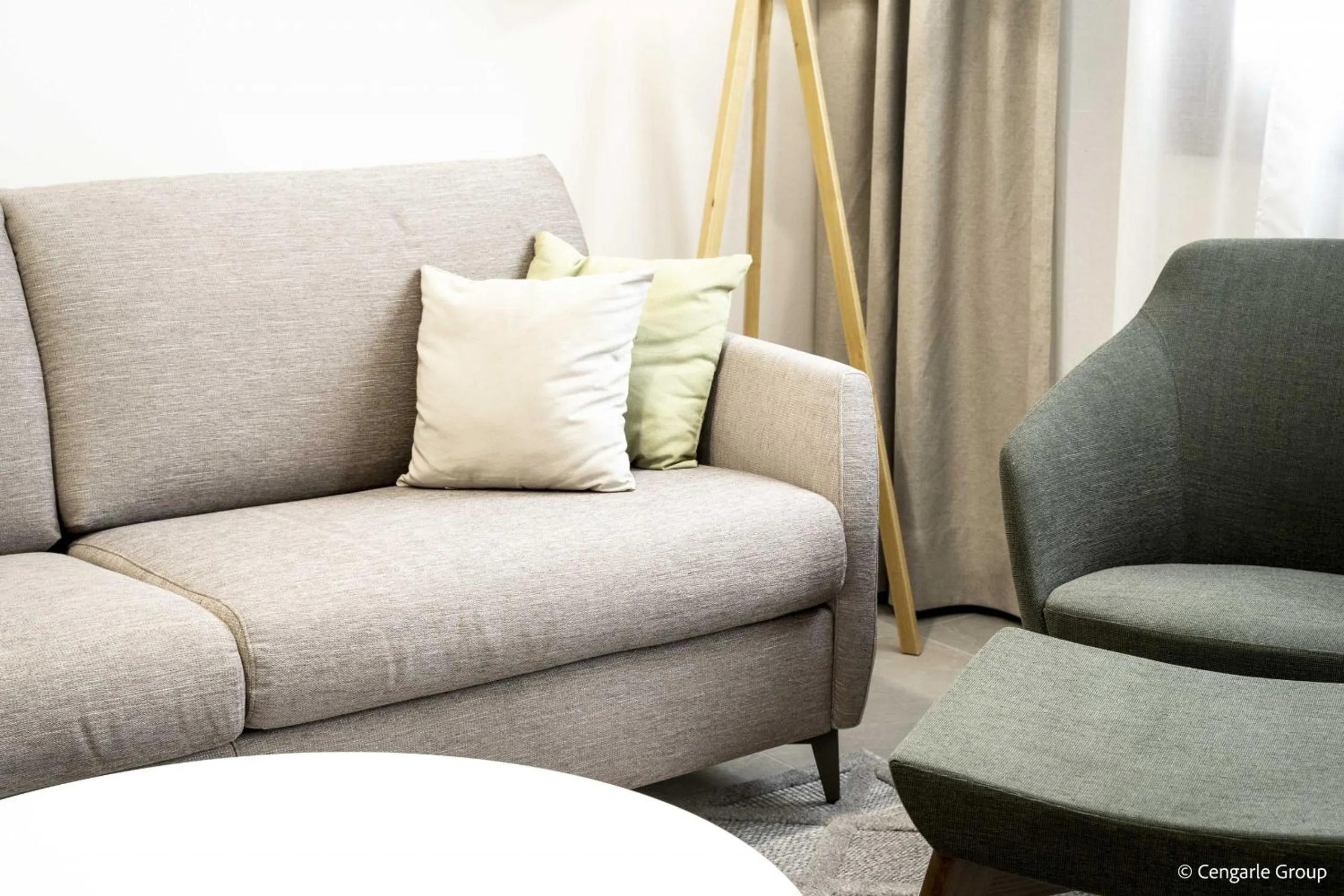 Communal lounge/ TV room in Bergresort Gerlitzen by ALPS RESORTS