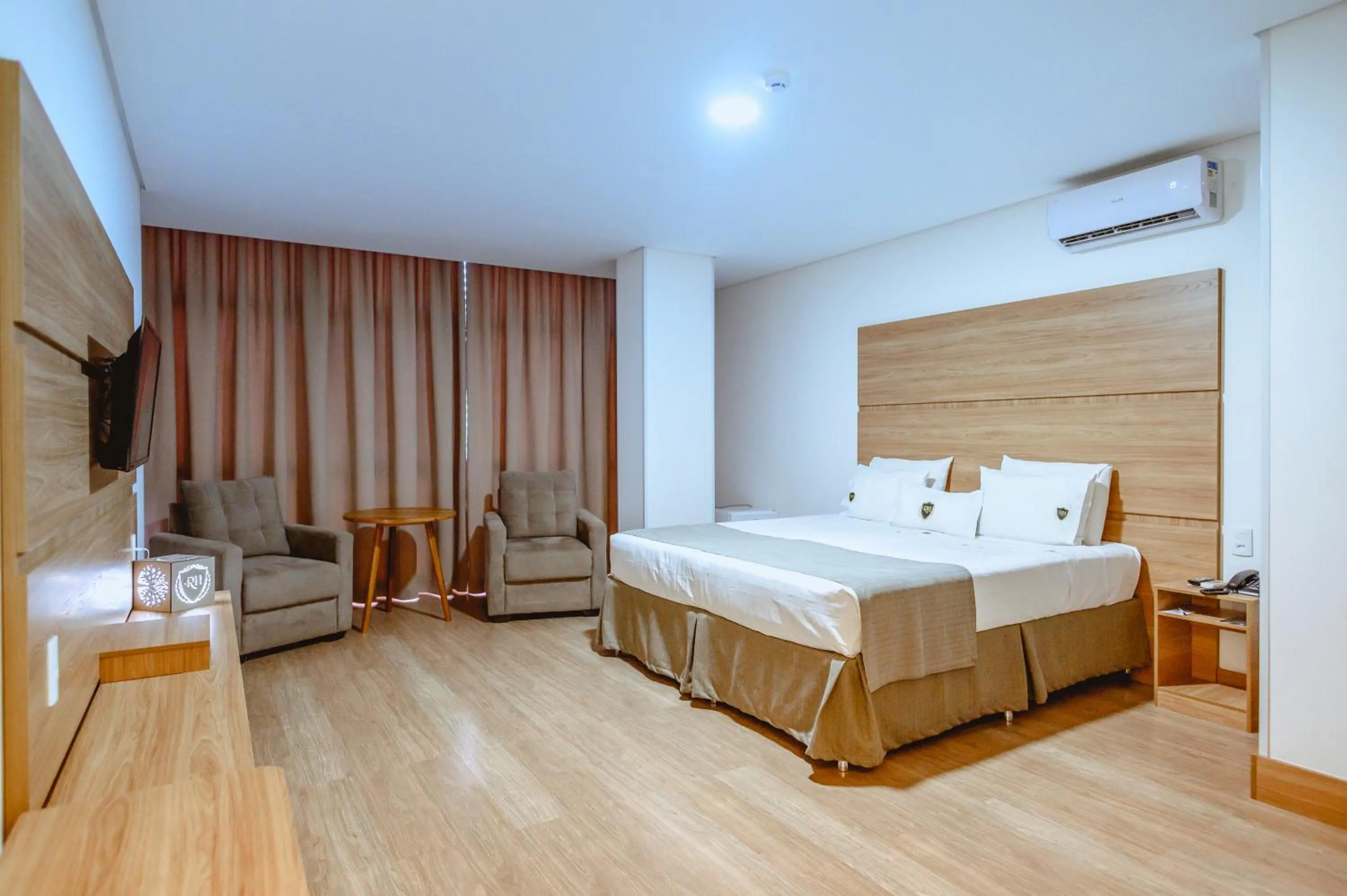 Bed in Riellis Center Hotel