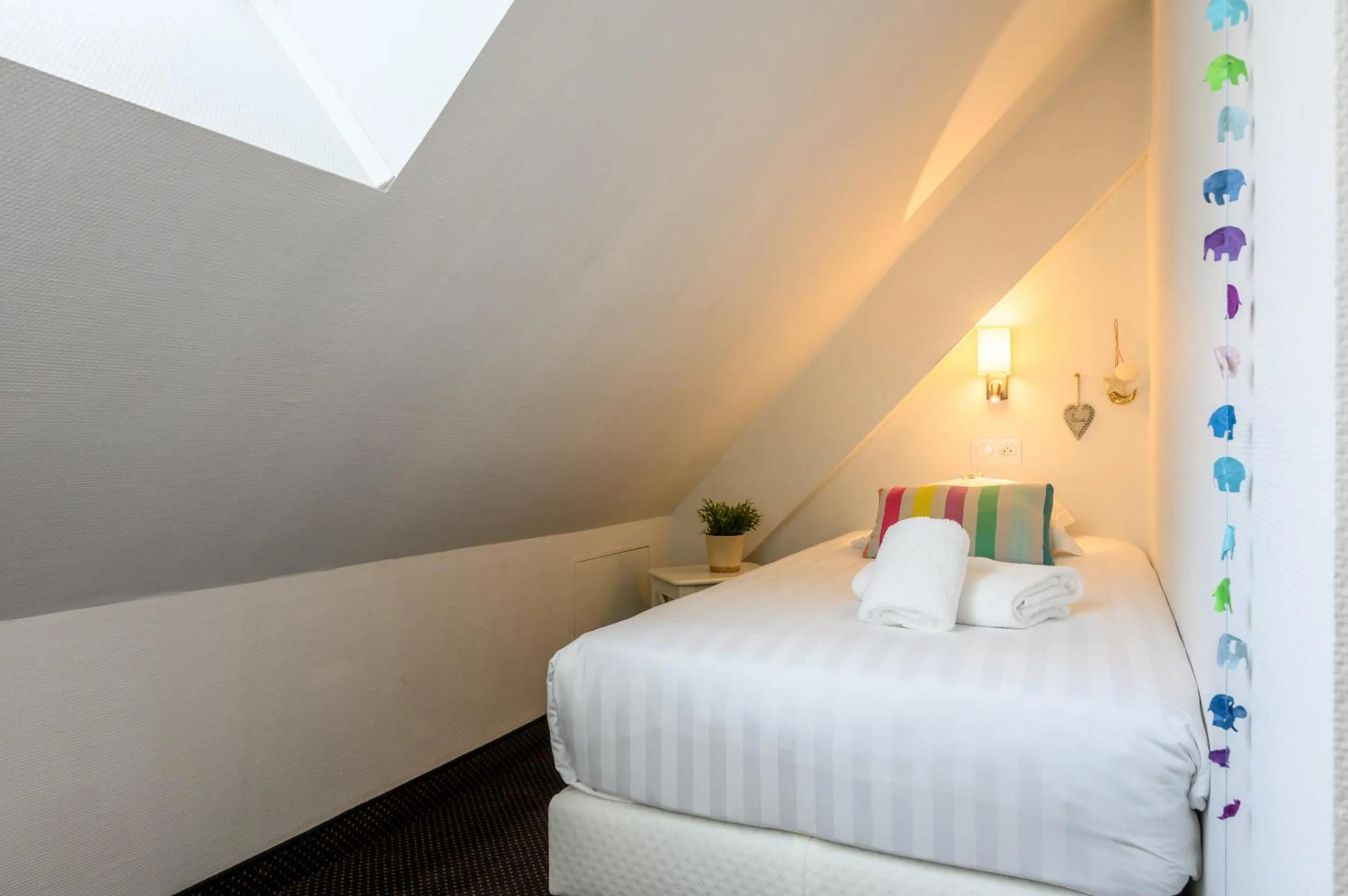 Bed in Hôtel le Saint Nicolas