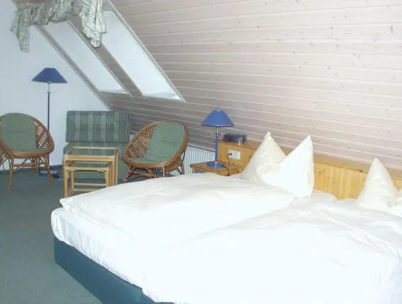 Photo of the whole room, Bed in Hotel Auf Dem Langenhof Wunstorf