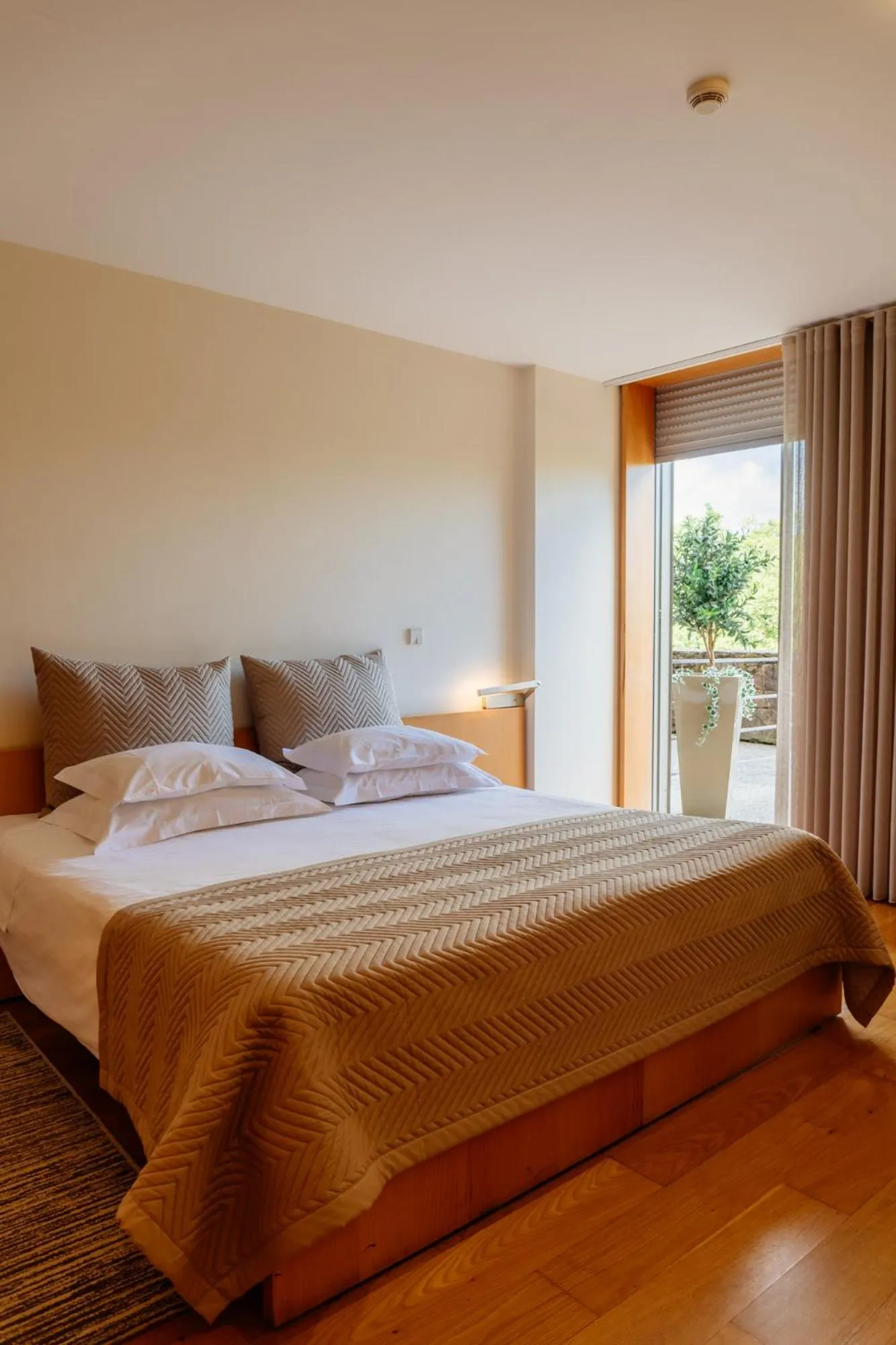 Bed in Axis Ponte de Lima Golf Resort Hotel