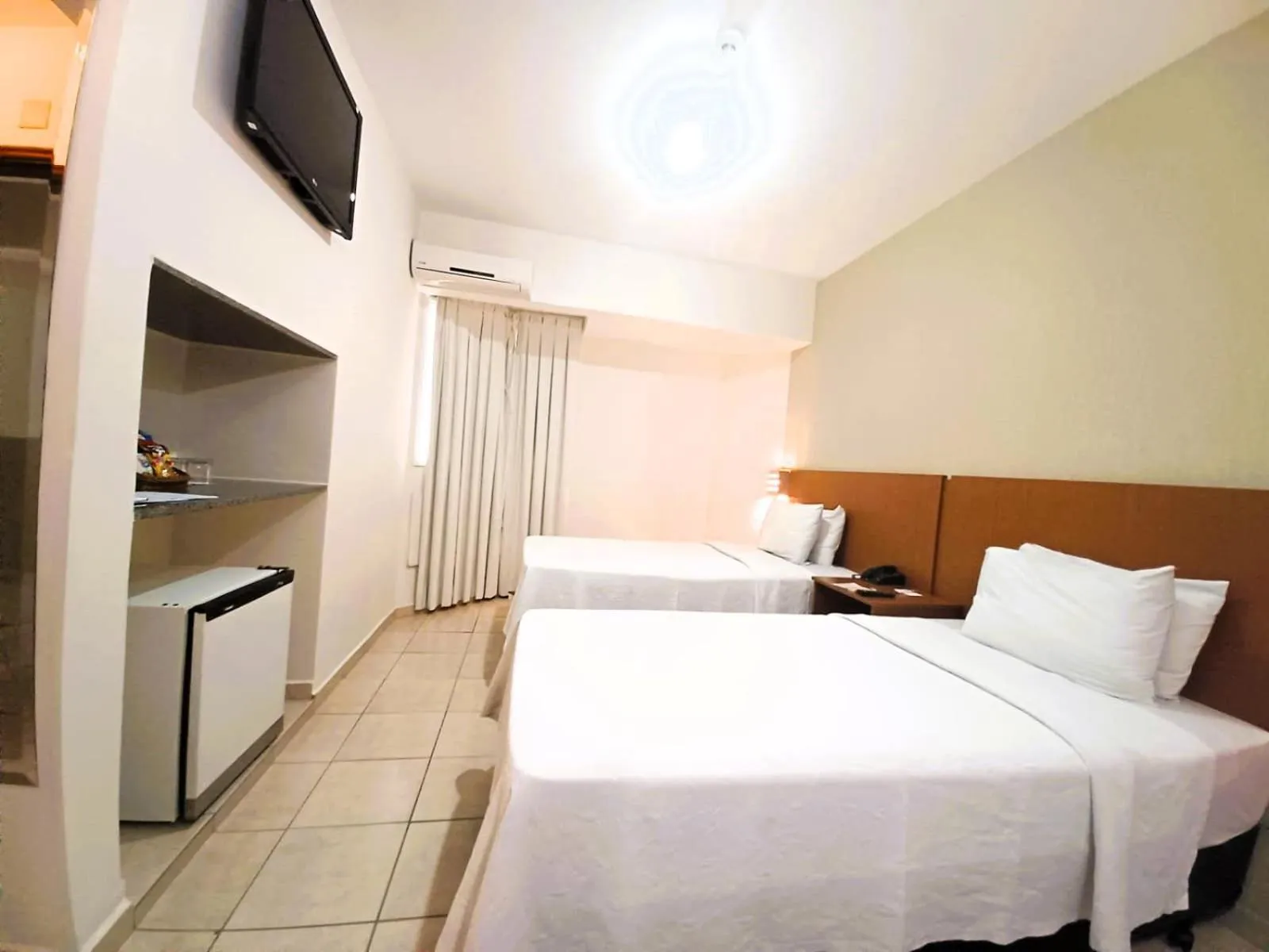 Bed in Hotel Riviera