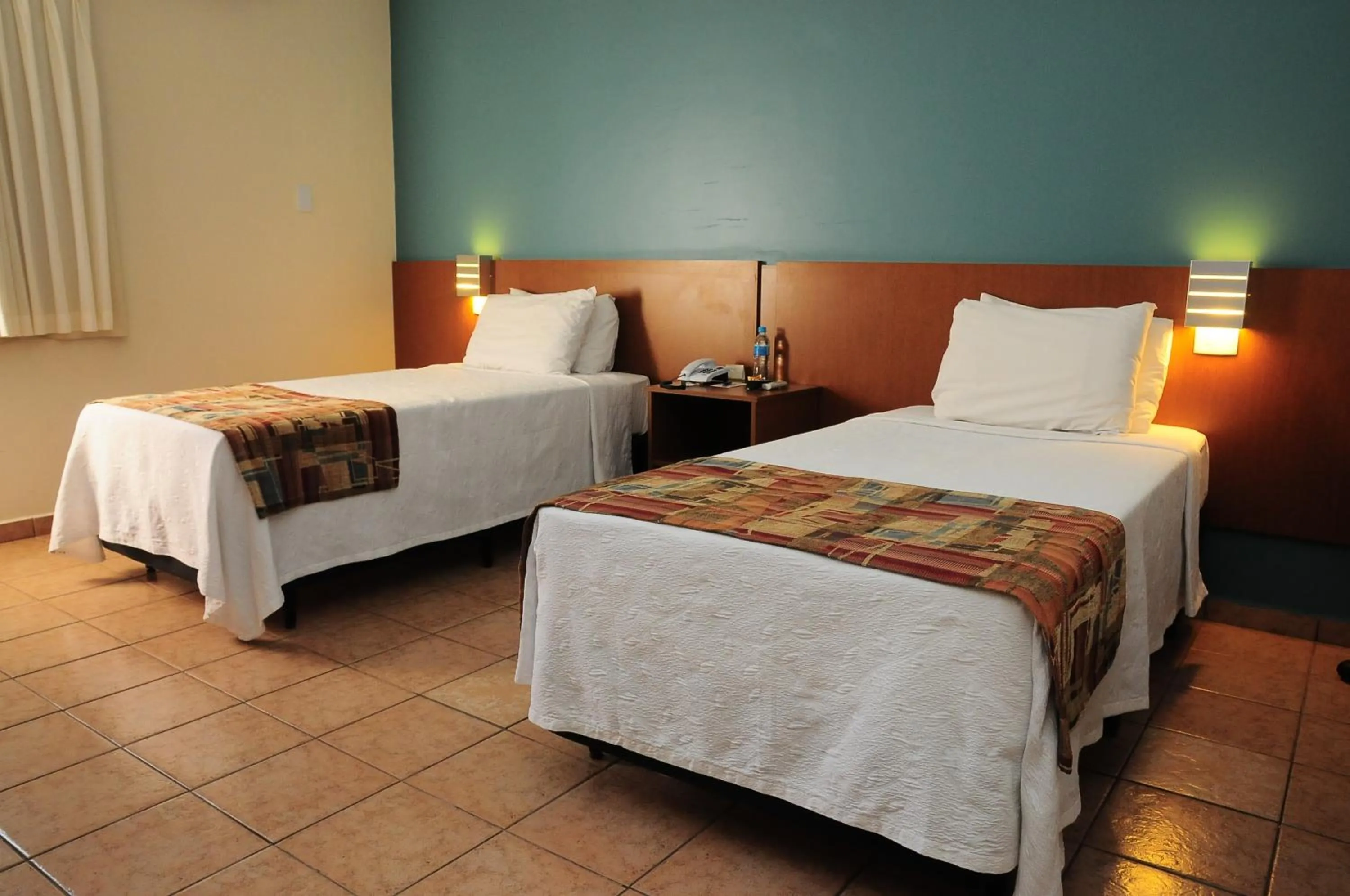 Property building, Bed in Hotel Riviera