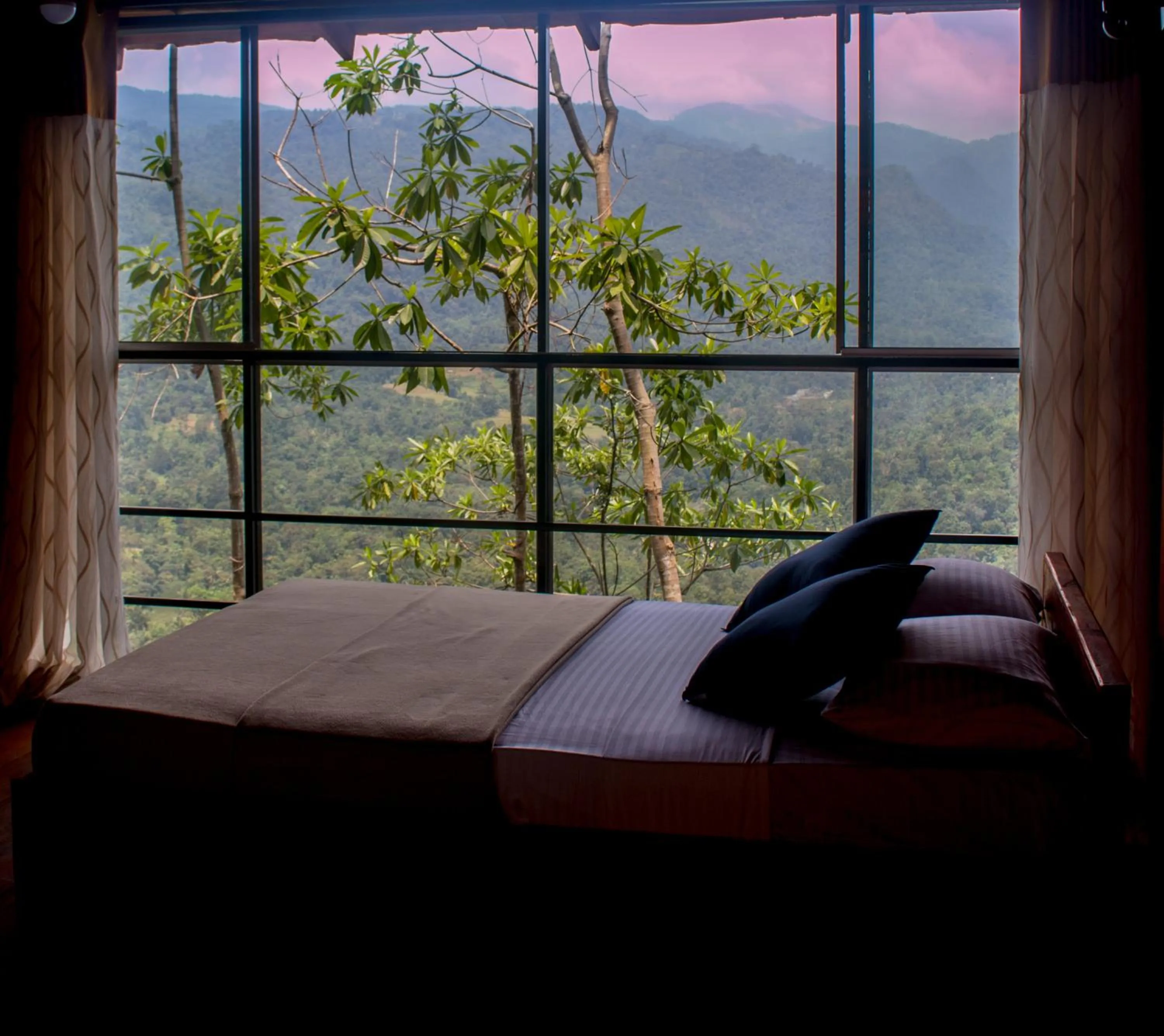 Bed in Tree Houses by Jungle River