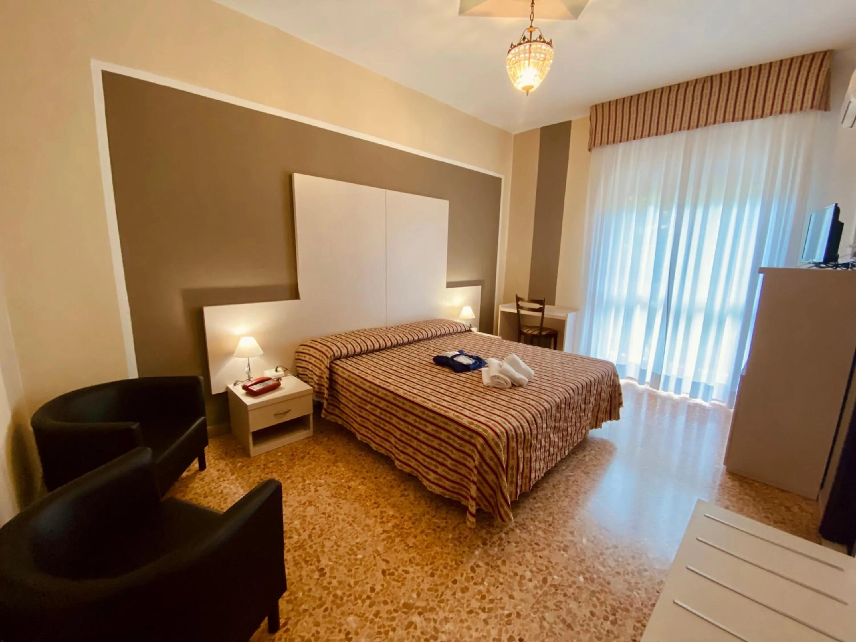 Bed in Art Hotel Pandos