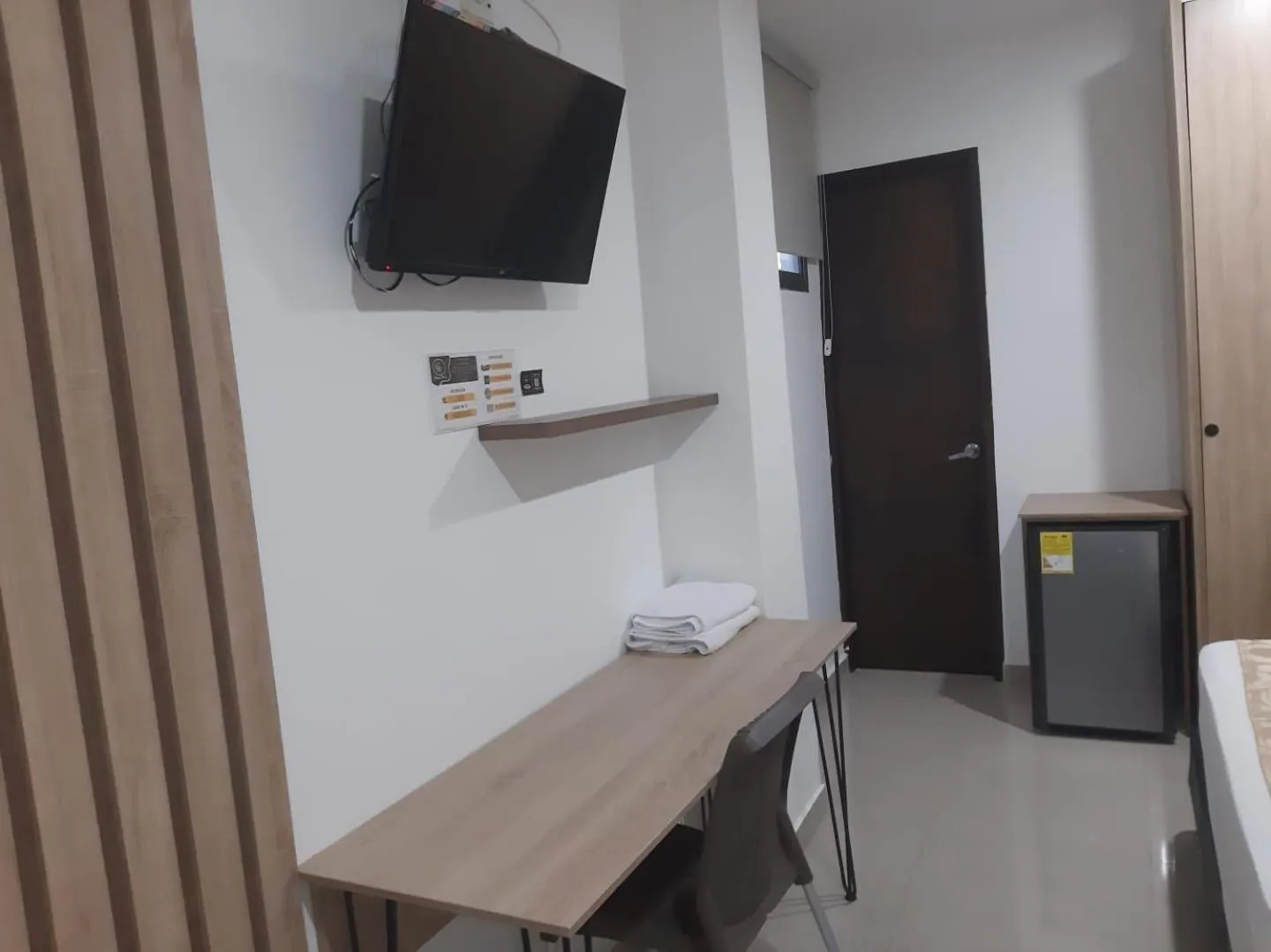 Bed in Genesis Hotel