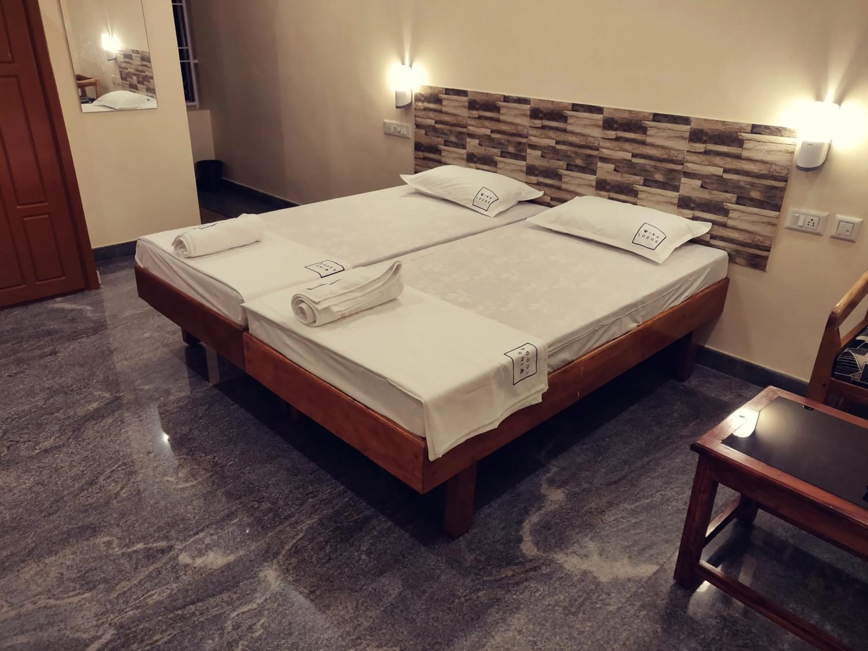 Bed in Hotel Wins