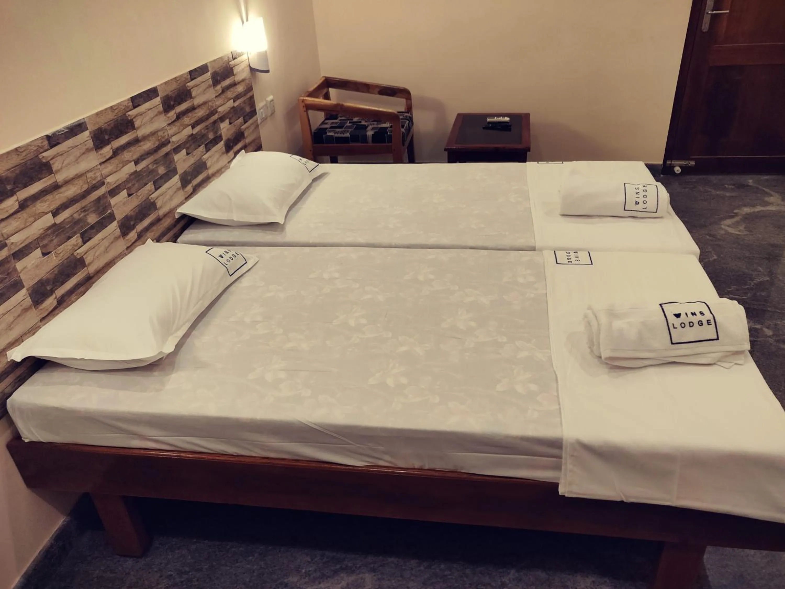 Bed in Hotel Wins