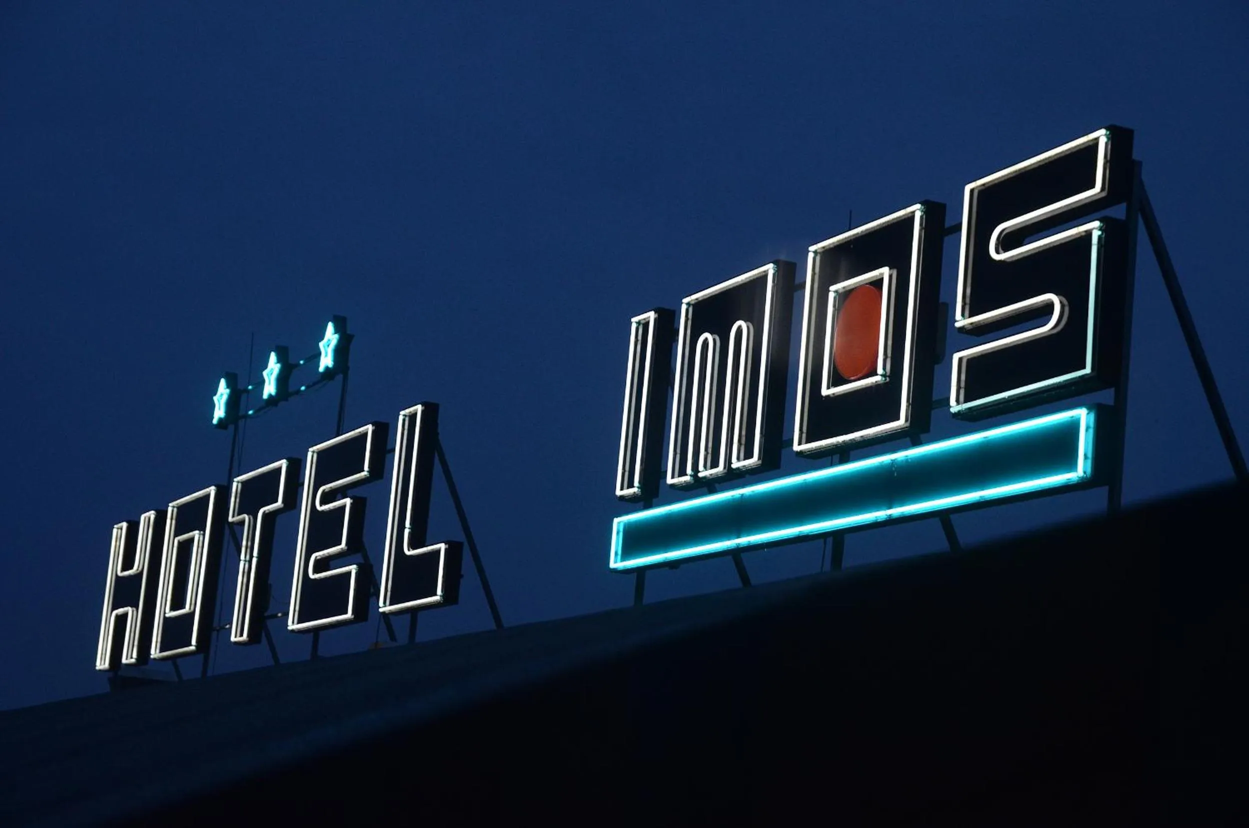 Property logo or sign in Hotel Imos