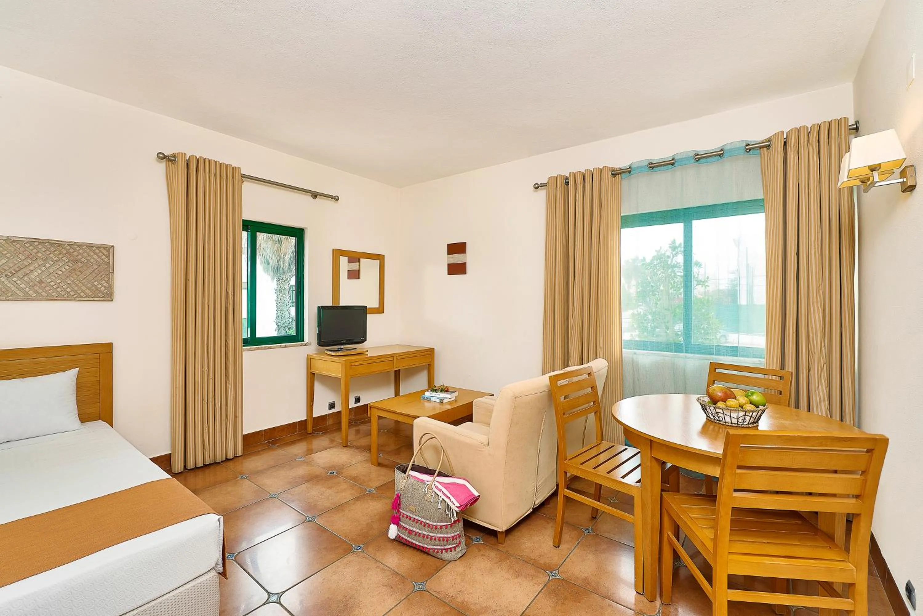 Living room, Bed in Oceanus Aparthotel